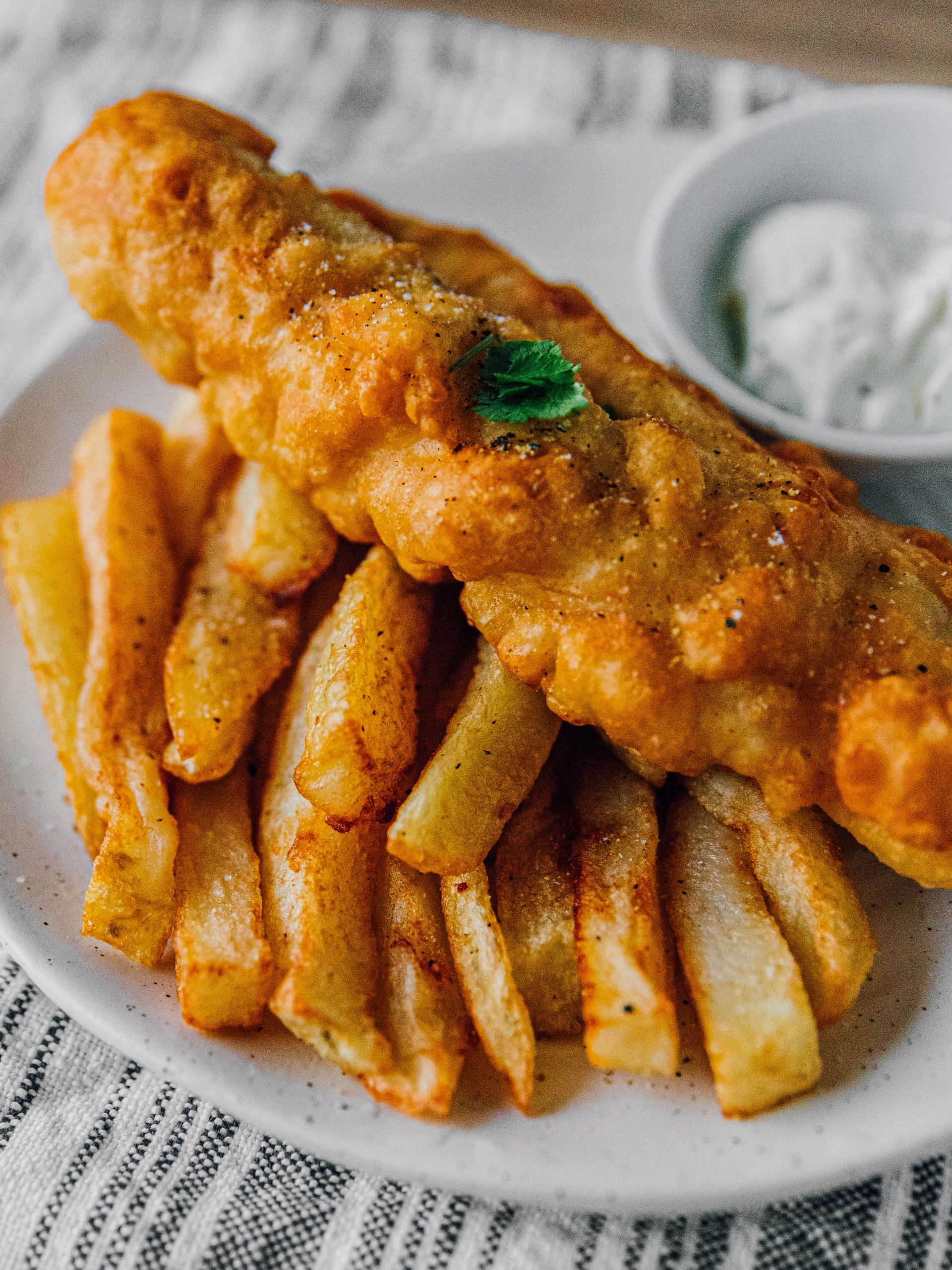 Traditional Homemade British Beer Battered Fish and Chips, with a classic  easy batter recipe