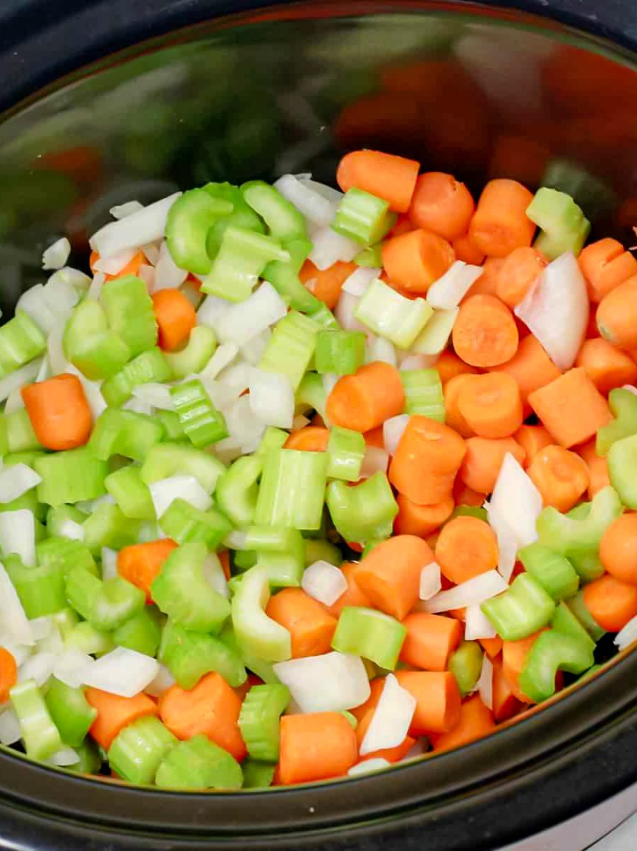 Place all of the veggies in a large crockpot