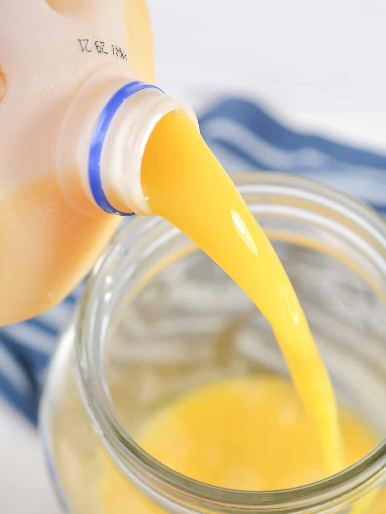 Adding orange juice with no pulp.