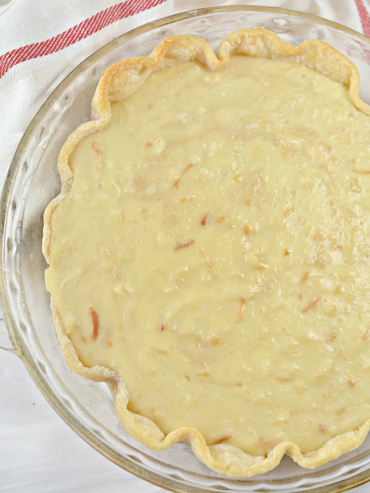 Pour the filling mixture into the prebaked pie crust and allow to cool.