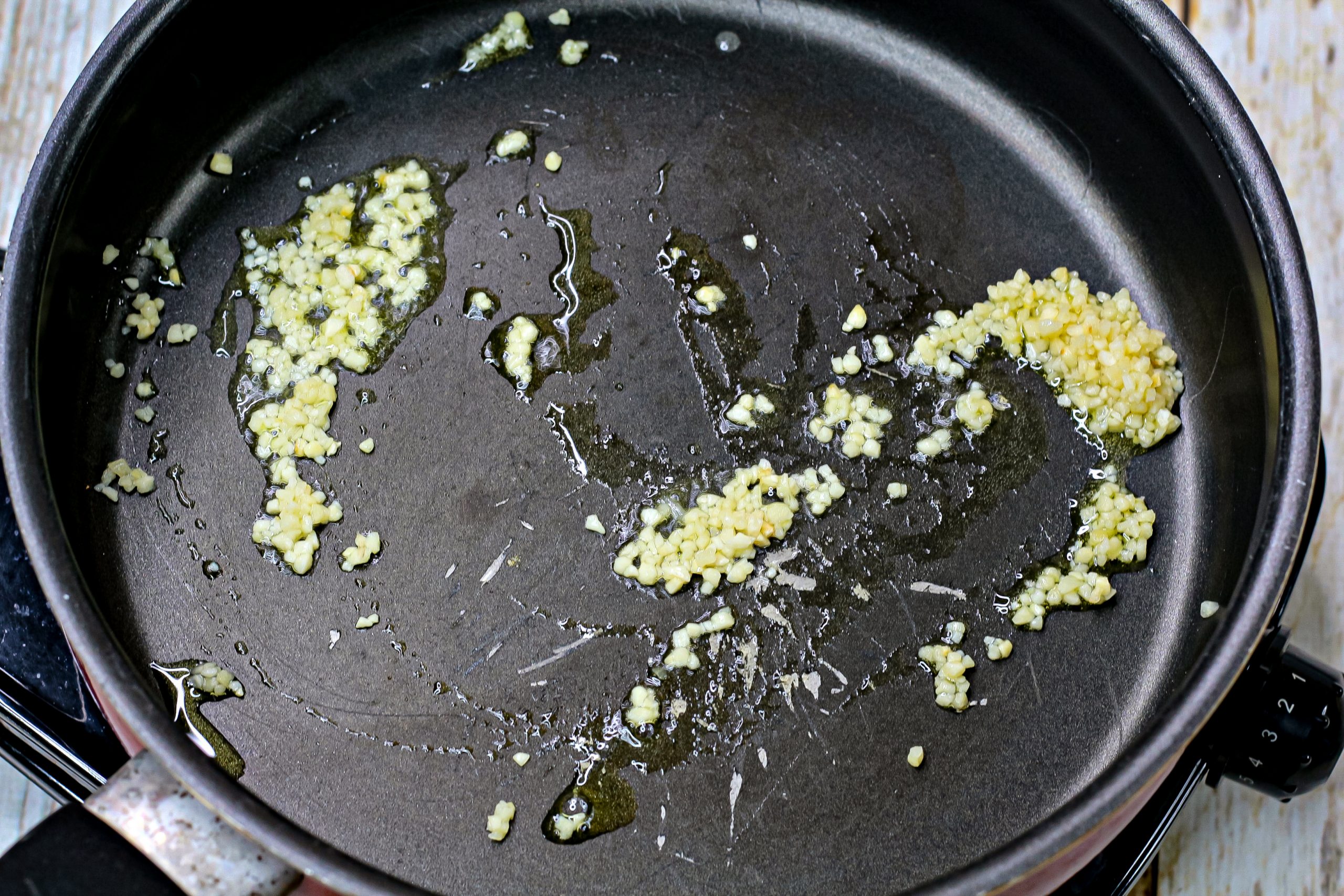 Stir the garlic for 1 minute, until fragrant.