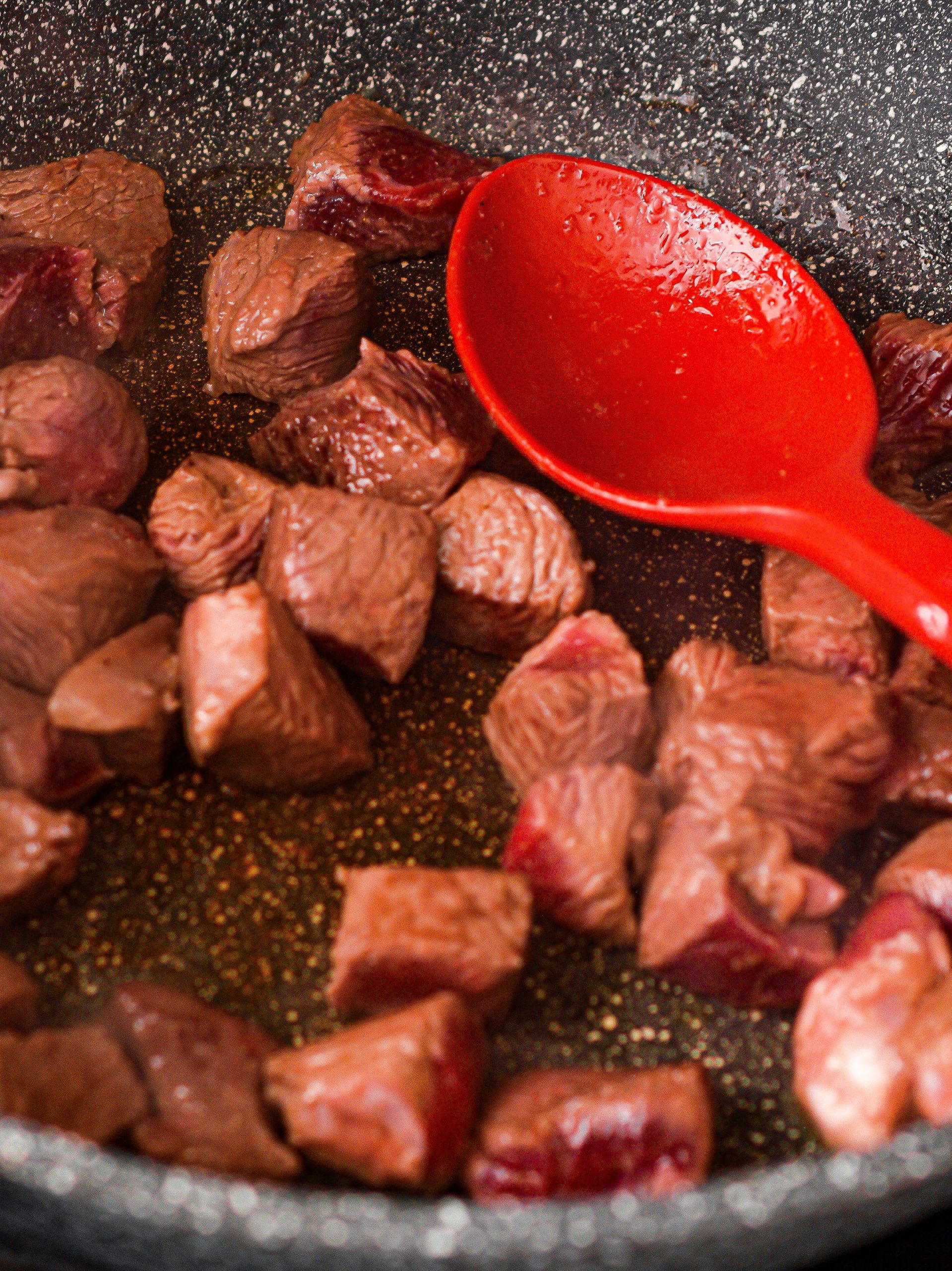 Add in the steak and season with salt, pepper, and seasonings of your choice.