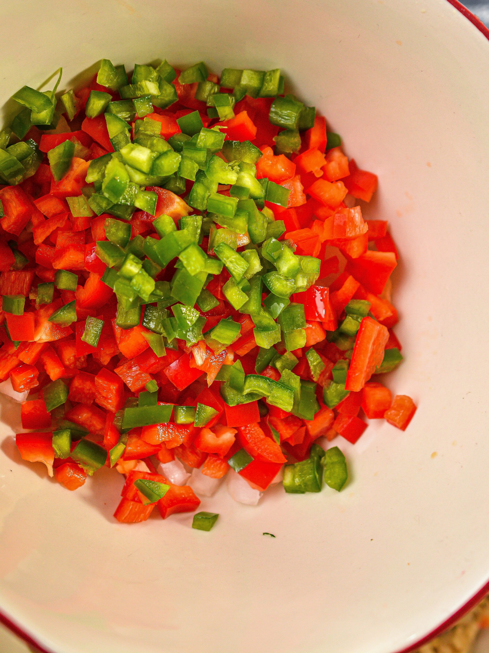 add the bell pepper and jalapeno.