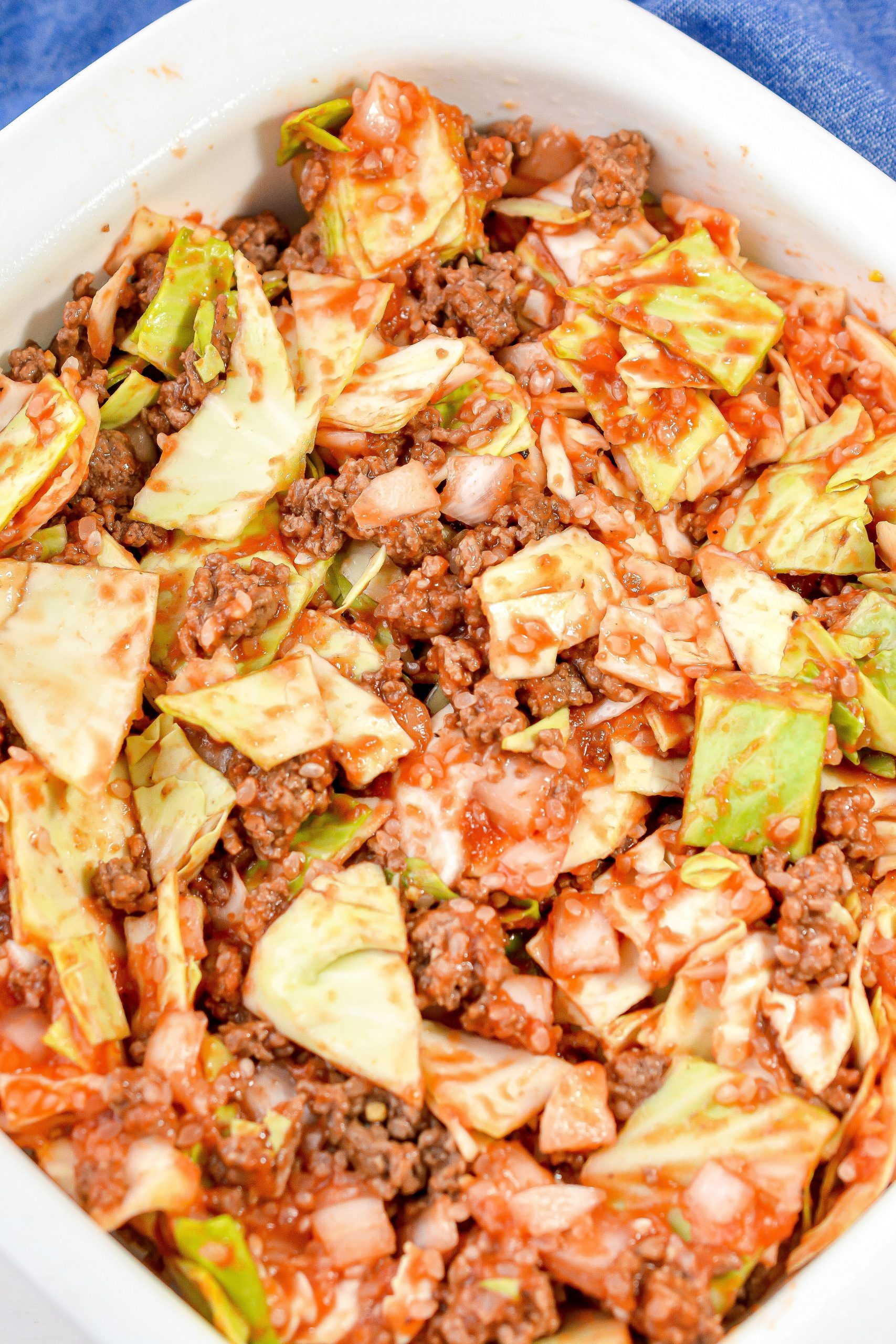 Layer the cabbage and meat mixture in the bottom of a 9x9 baking dish