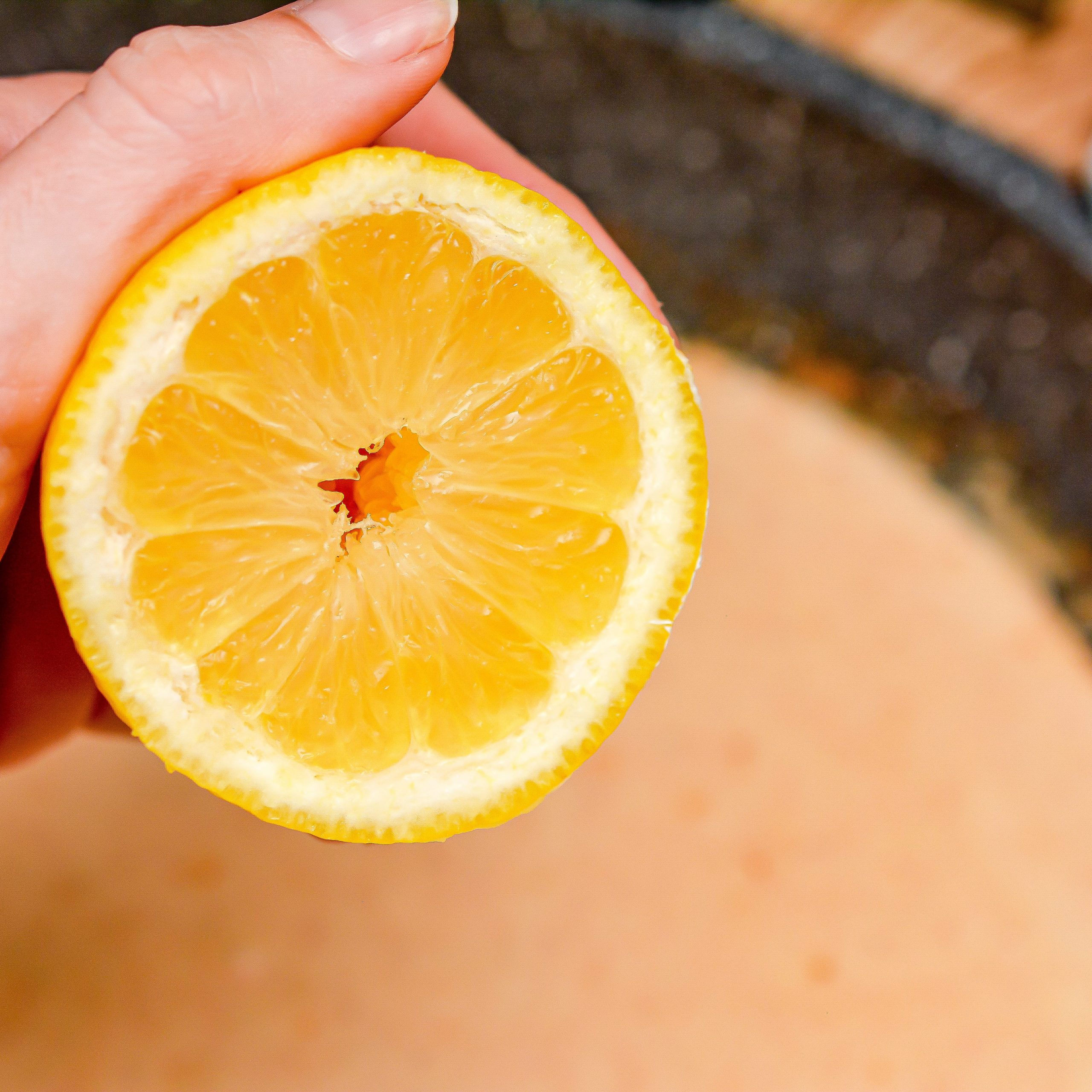 Squeeze the fresh lemon.