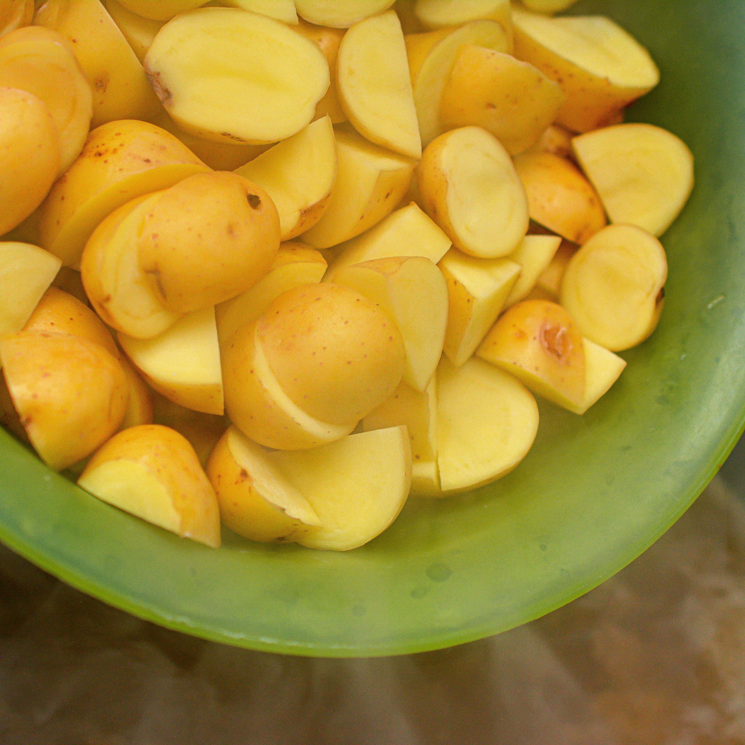 Place the potatoes into the pot, and simmer on medium low heat for 10-12 minutes until the potatoes are softened. 