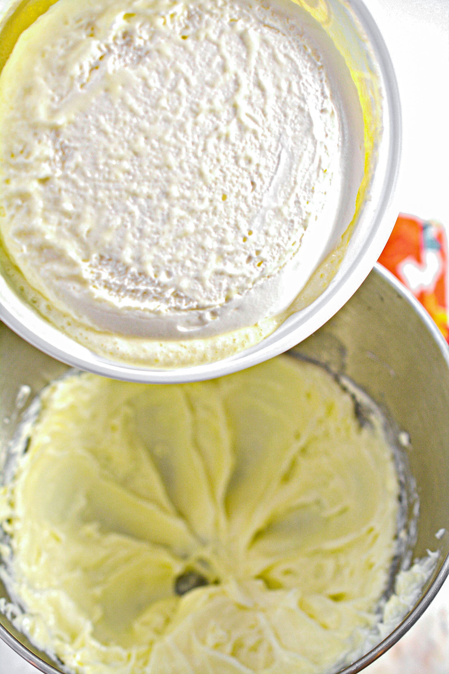 Add the whipped topping to the cream cheese and fold in to combine.