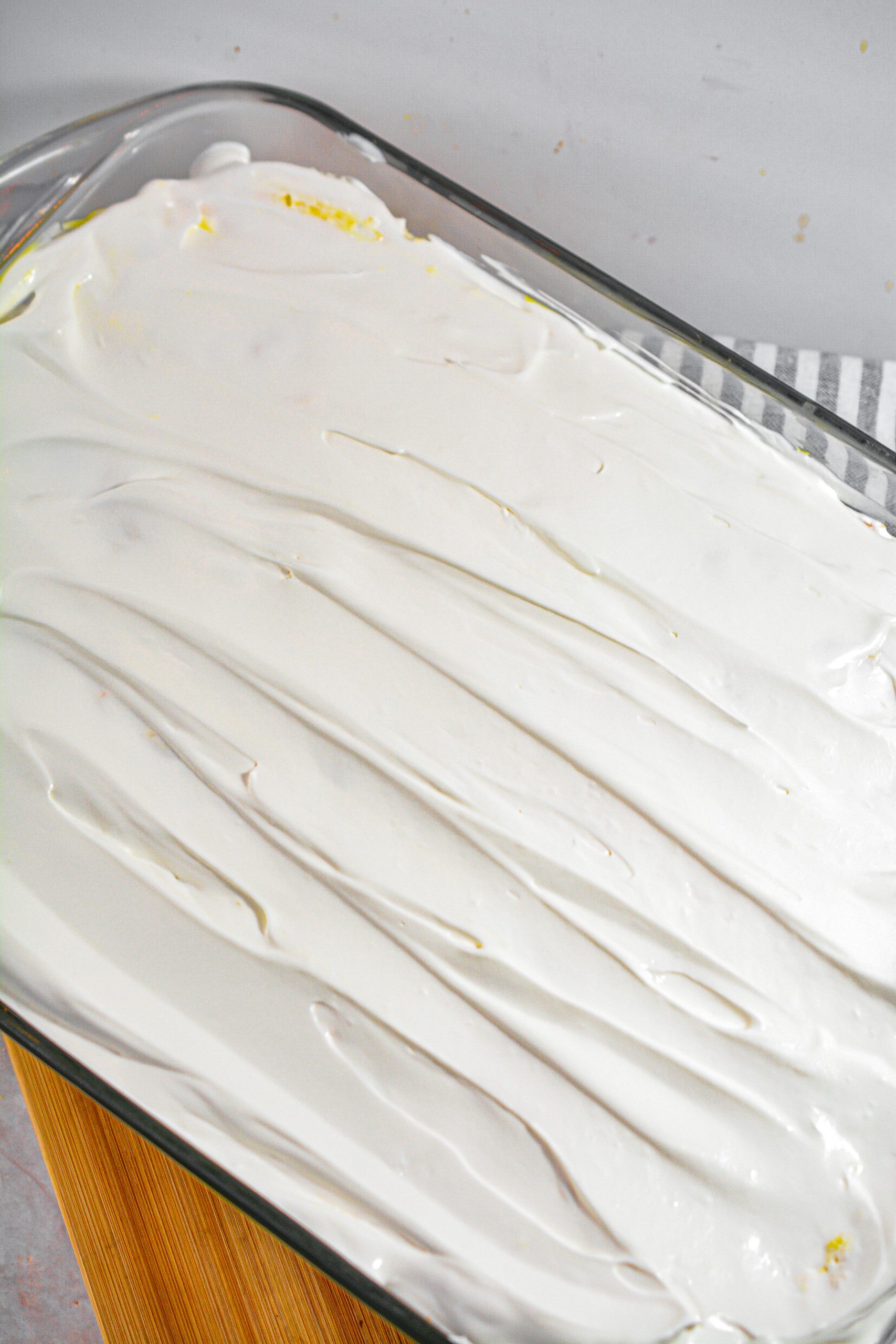 Spread the Cool Whip over the pudding layer.