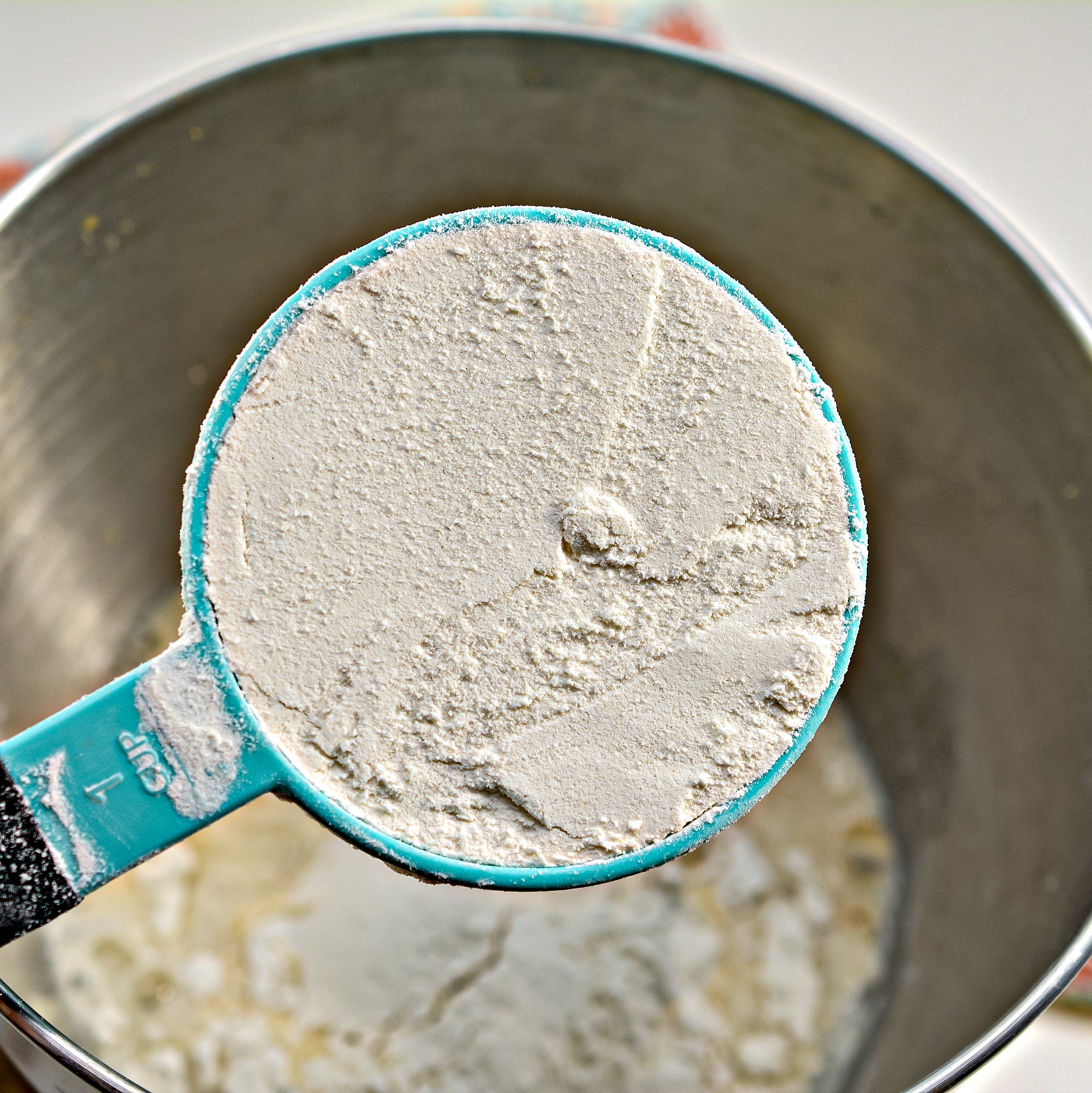 Add 2 cups of flour to the mixing bowl.