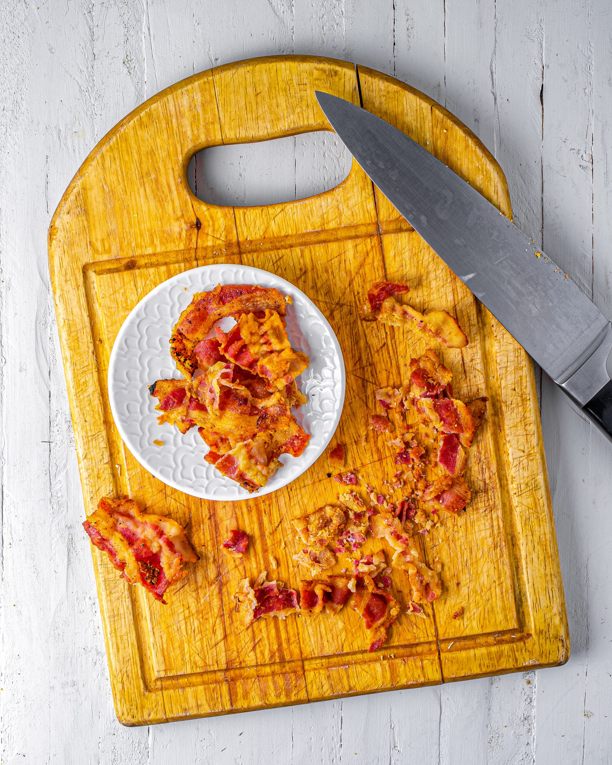 Fry the bacon until crispy, then crumble and set aside. 