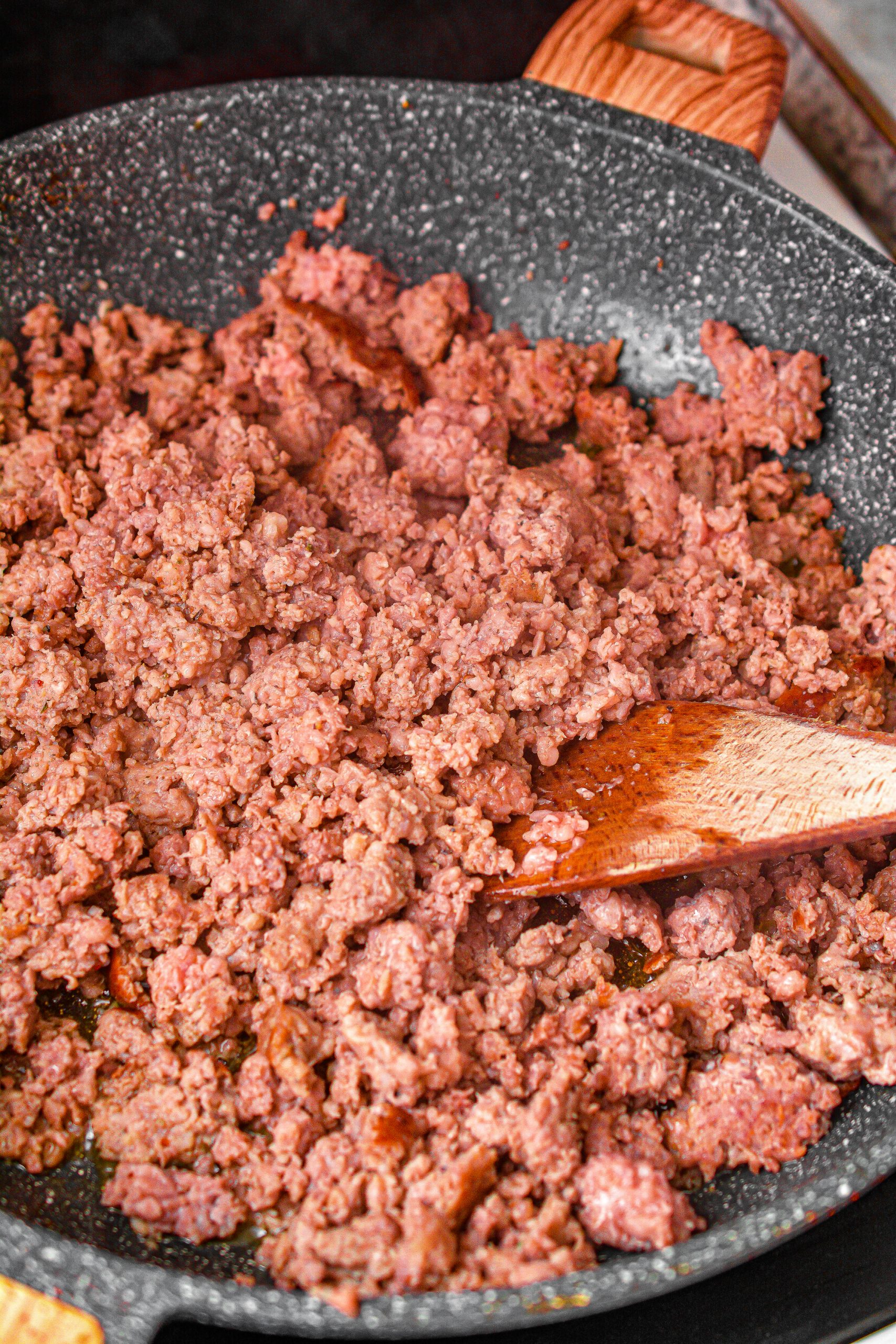 Saute the sausage over medium-high heat until completely browned. Drain any excess grease.