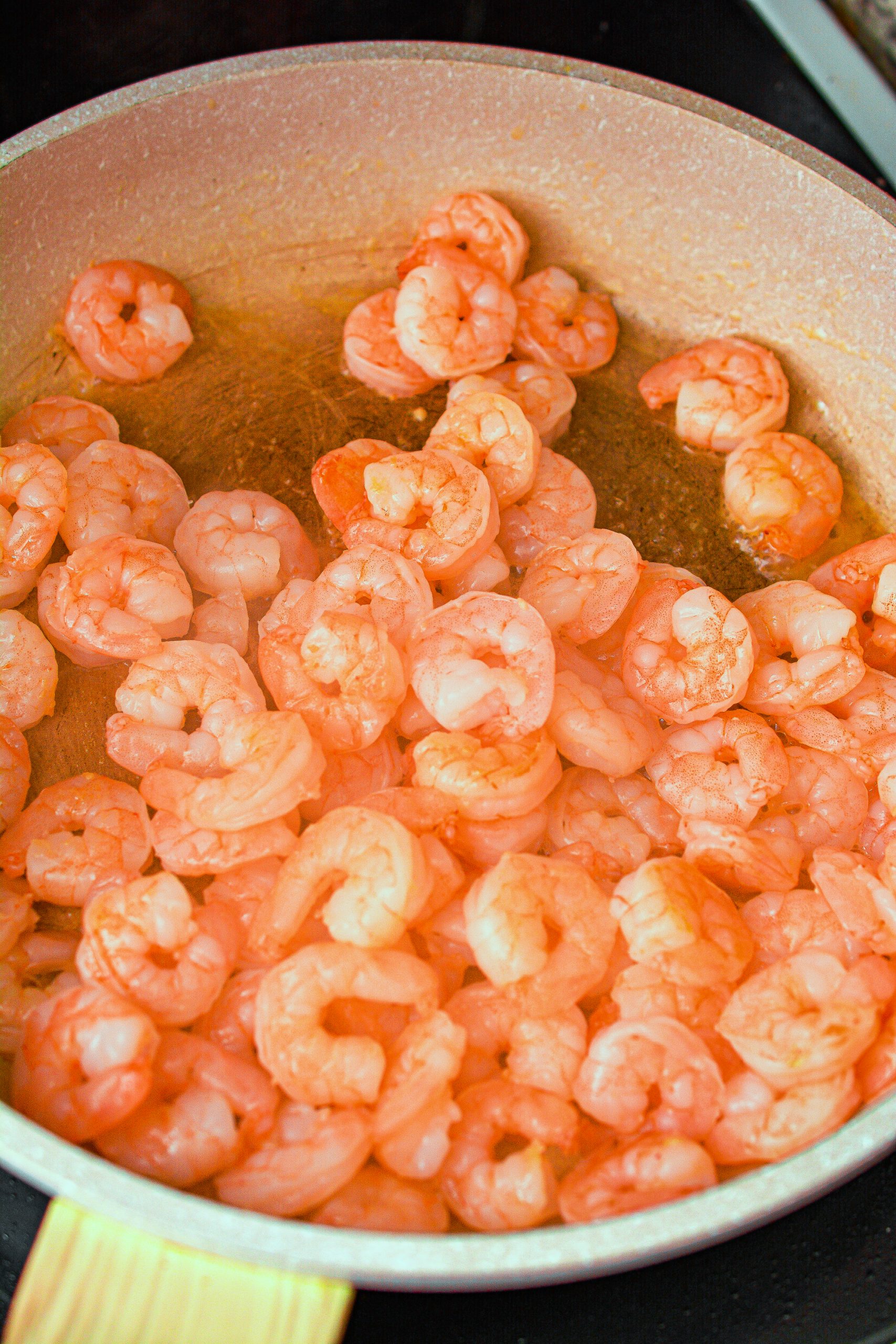 Add the butter to the skillet over medium-high heat, and cook the shrimp with some salt. Cook until done, and remove from the skillet to set aside