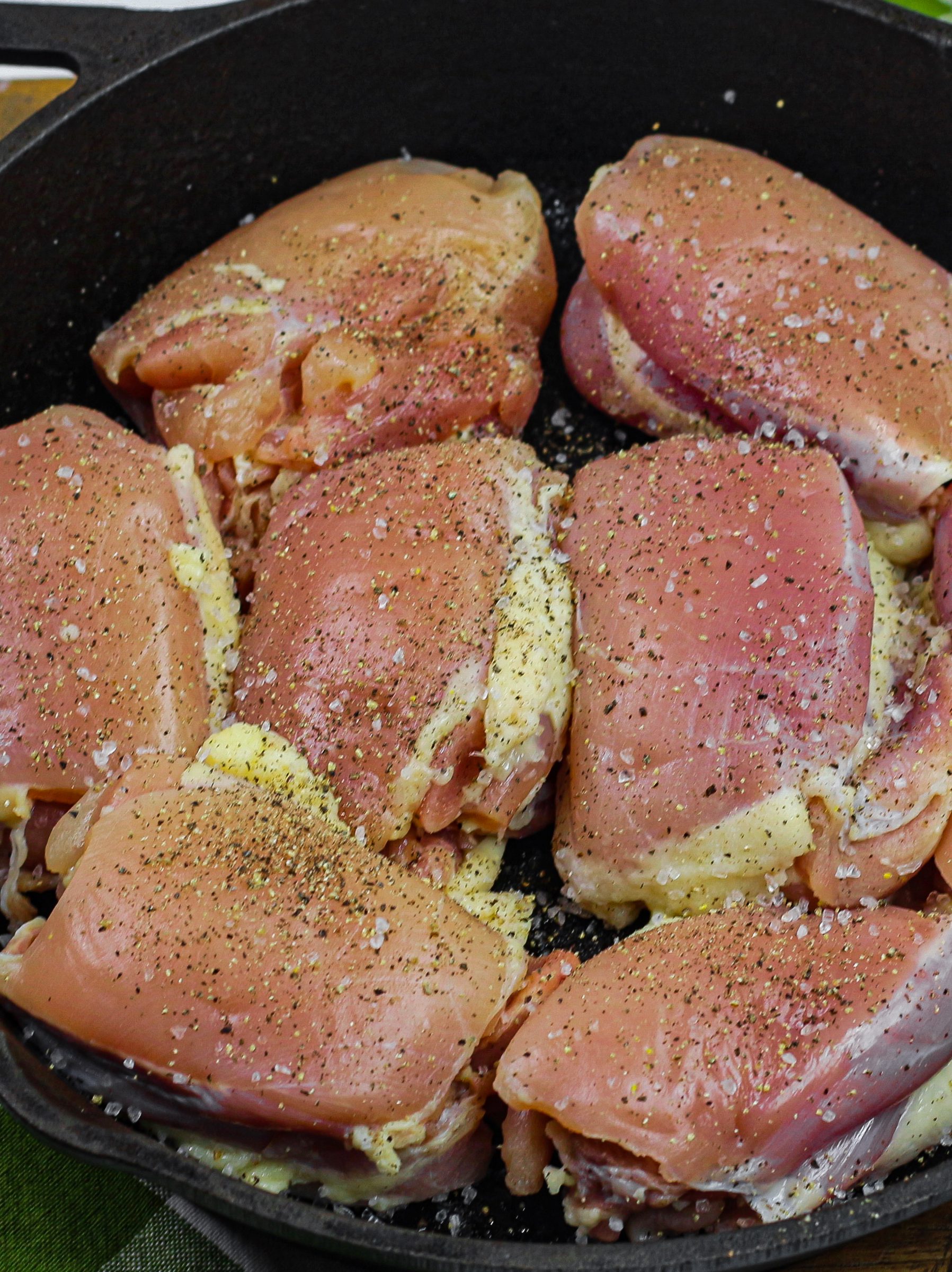 place the chicken into the cast iron.