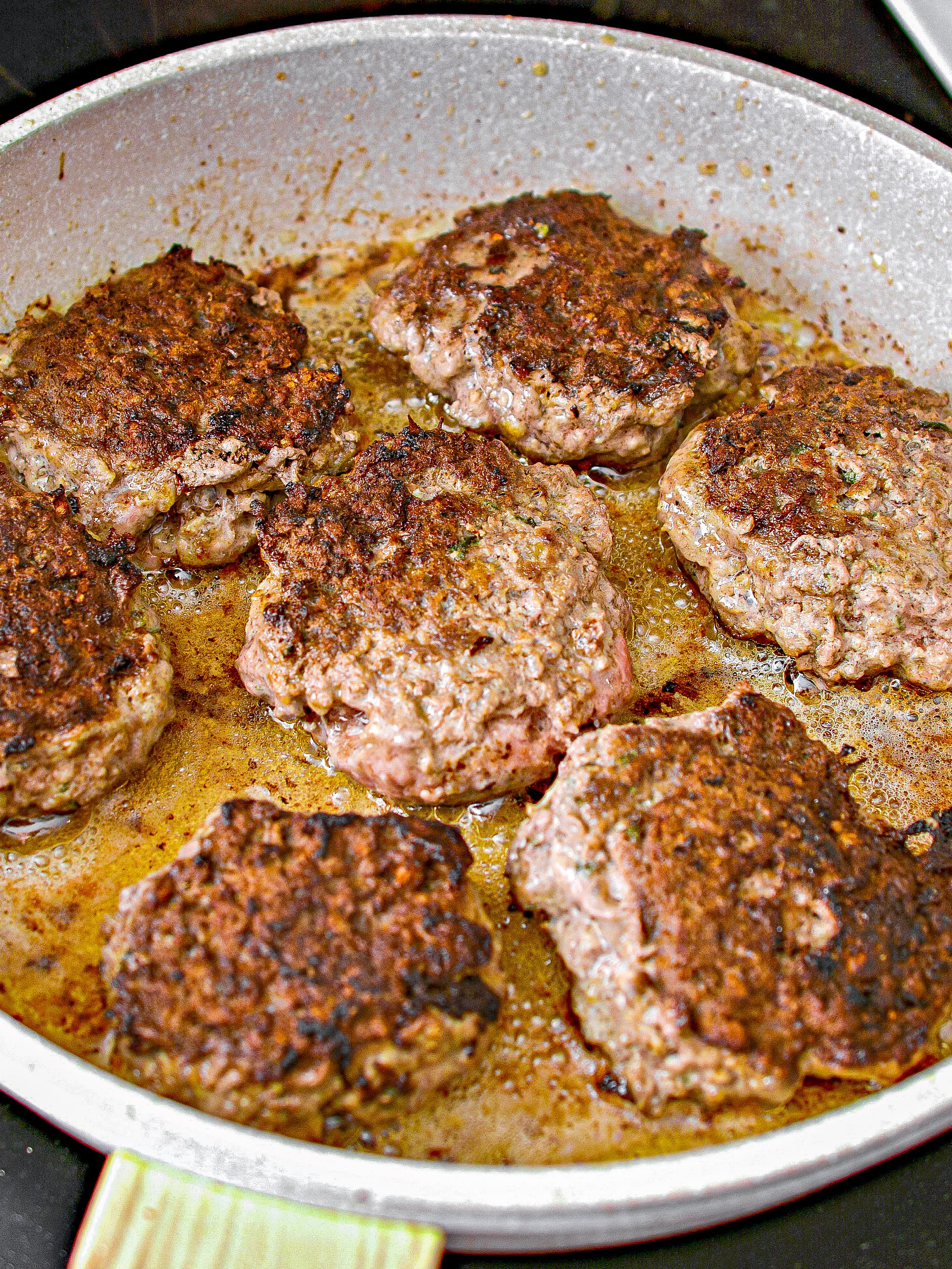 Heat a skillet over medium-high heat on the stove, and cook the patties until done to your liking. Remove and keep warm.
