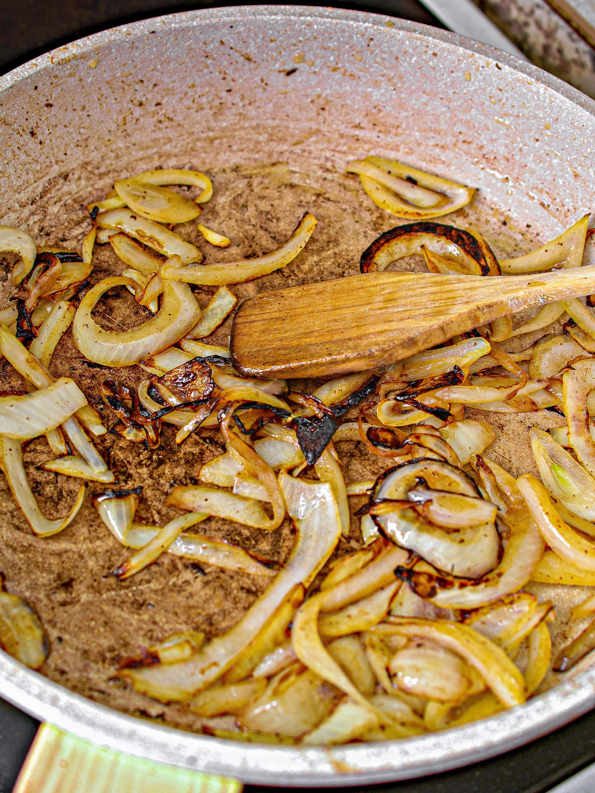 Add the onions to the heated skillet and cook until softened.