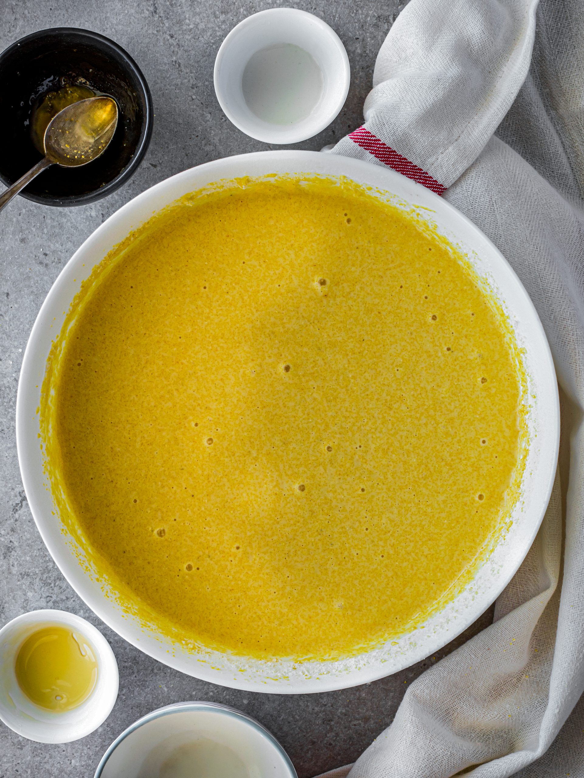 Blend the egg, buttermilk, honey, and vegetable oil into the dry ingredients. 