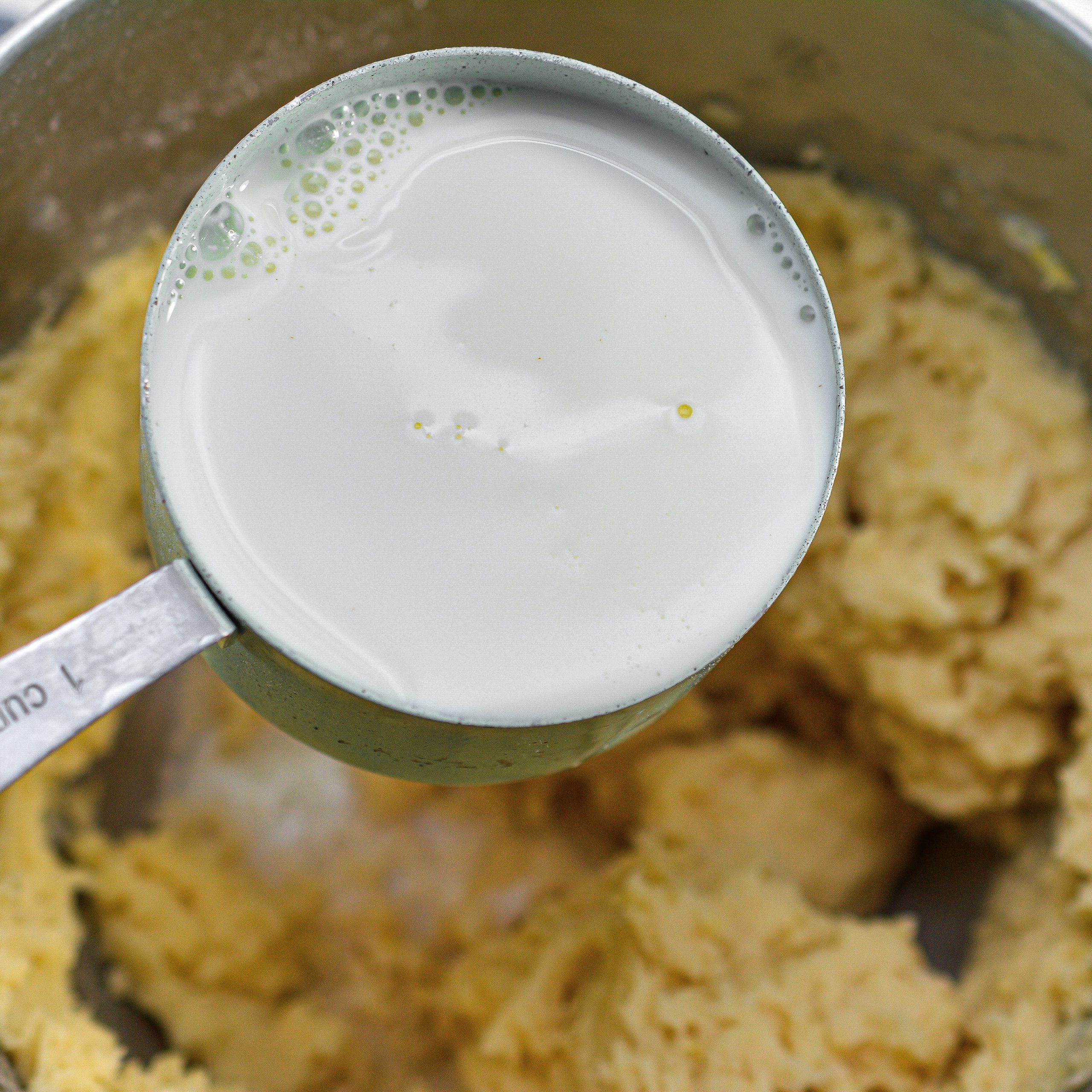 Beat in the milk until a creamy and smooth batter has formed.