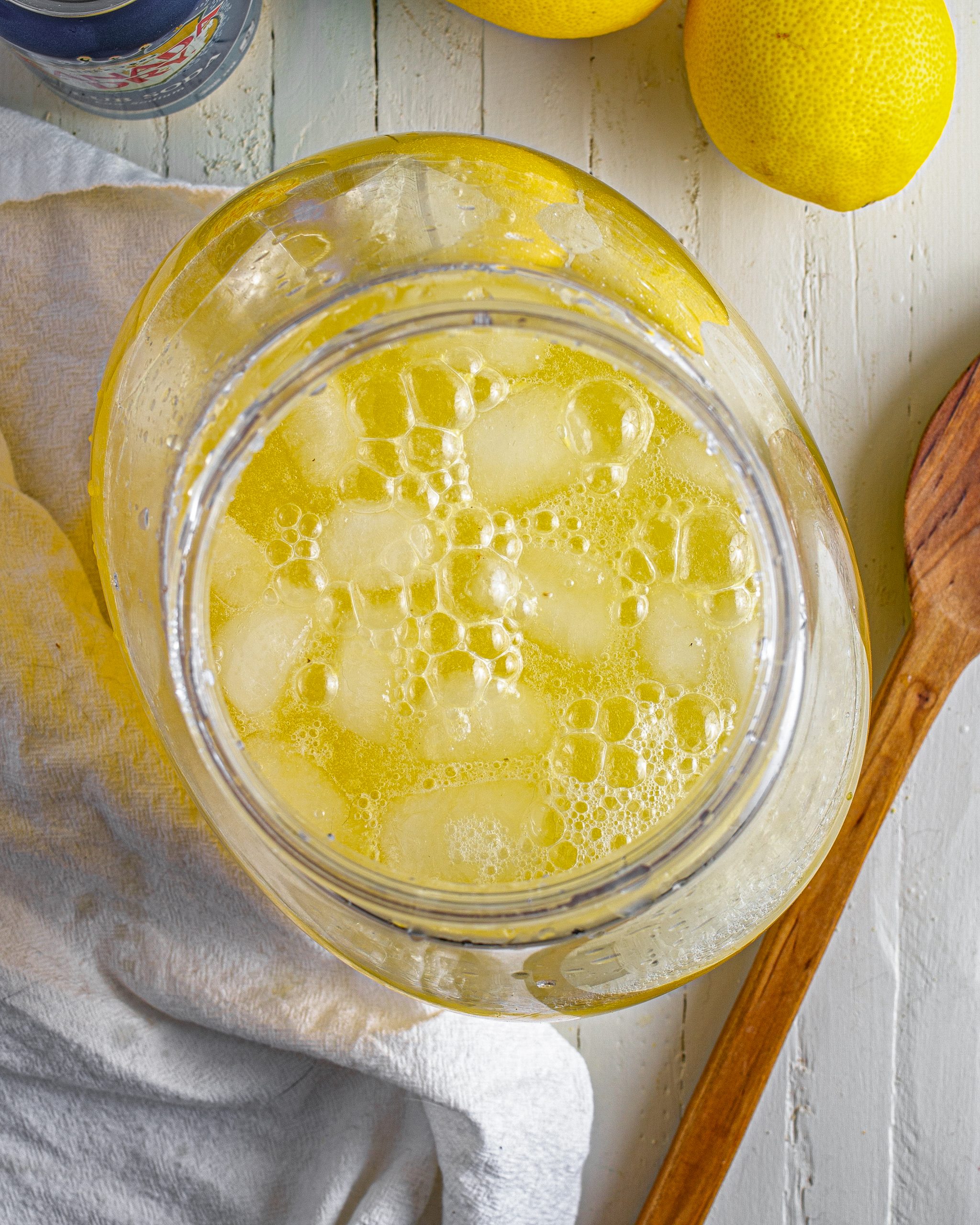 Mix the pineapple juice, sparkling water, and lemon juice into the pitcher. Stir to combine the ingredients well. 