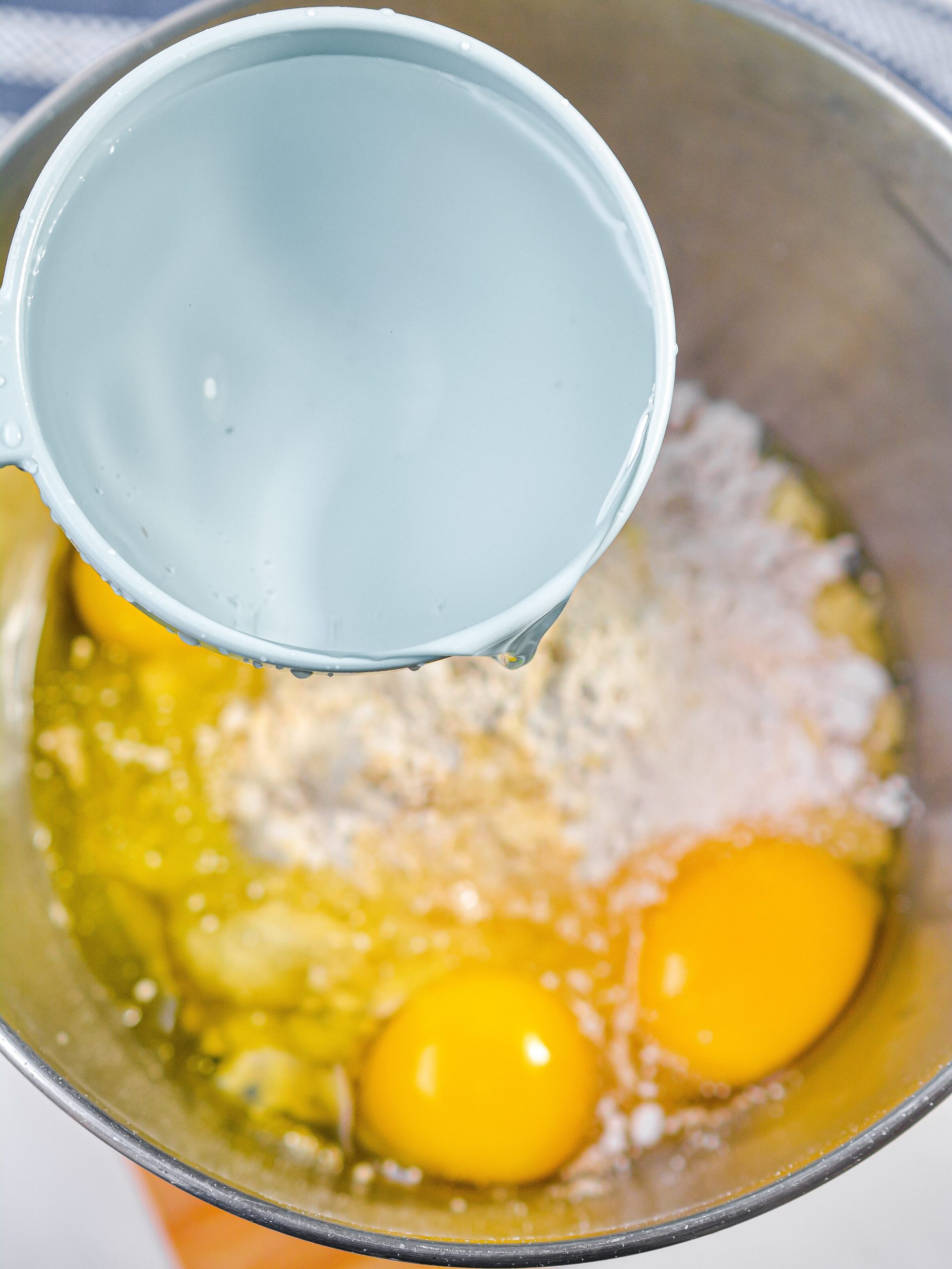  In a mixing bowl, combine the cake mix, eggs, and water.