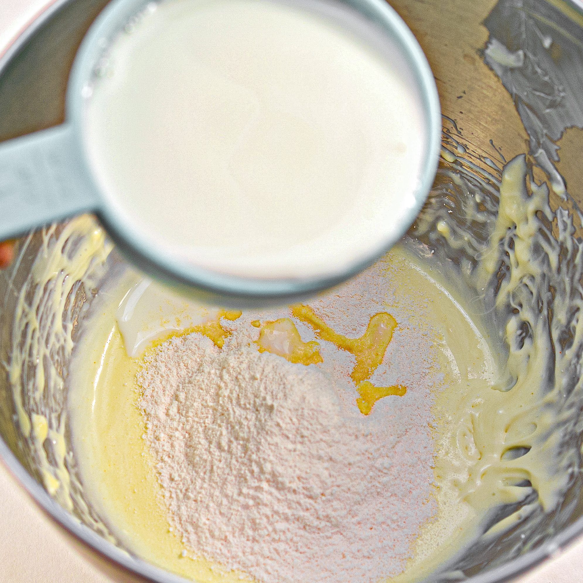 Add in the milk, pudding, and vanilla extract, and beat until the mixture thickens.