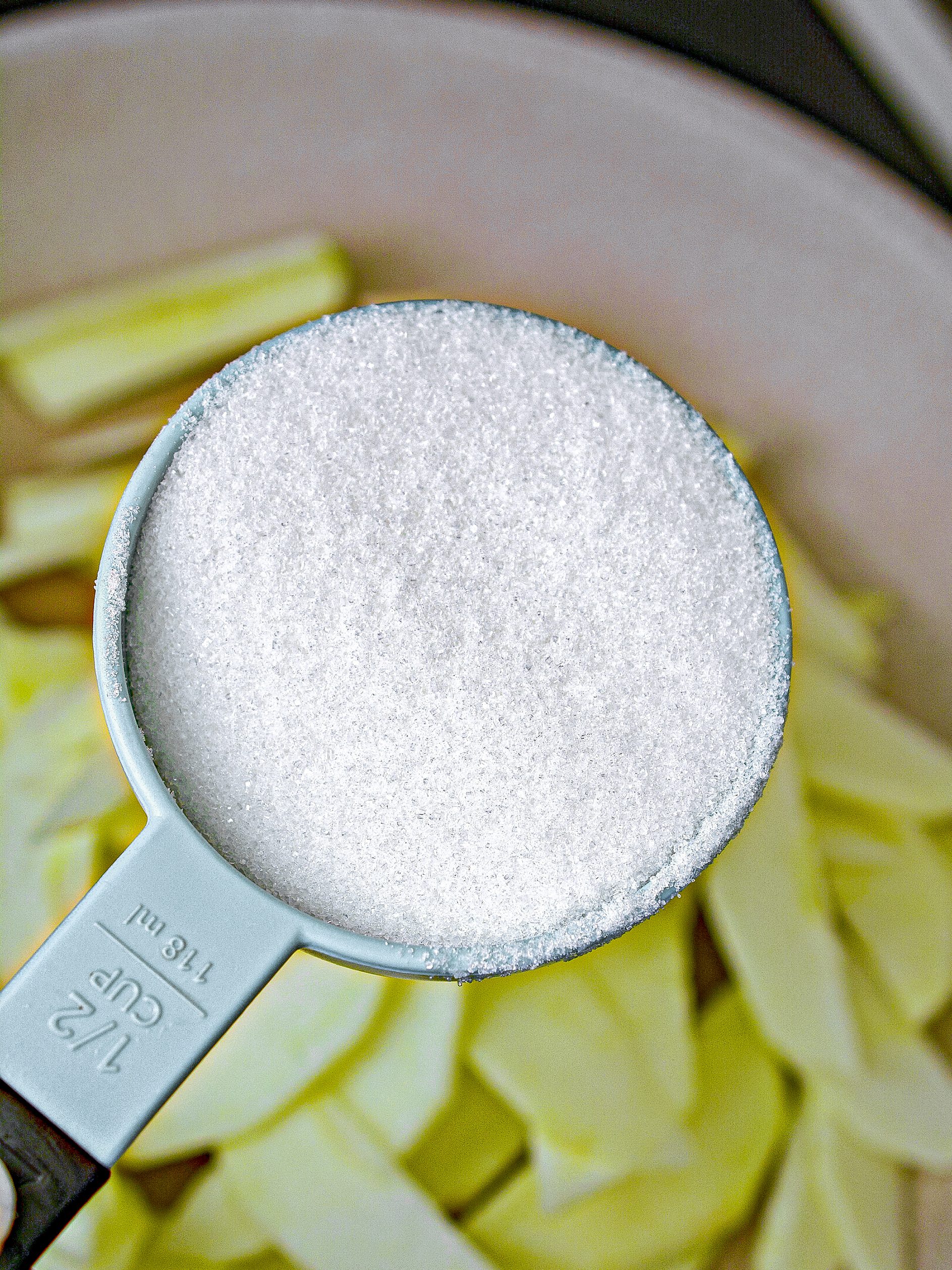 Add 2 Large Granny smith apples peeled and thinly sliced and ½ C. Granulated sugar. 