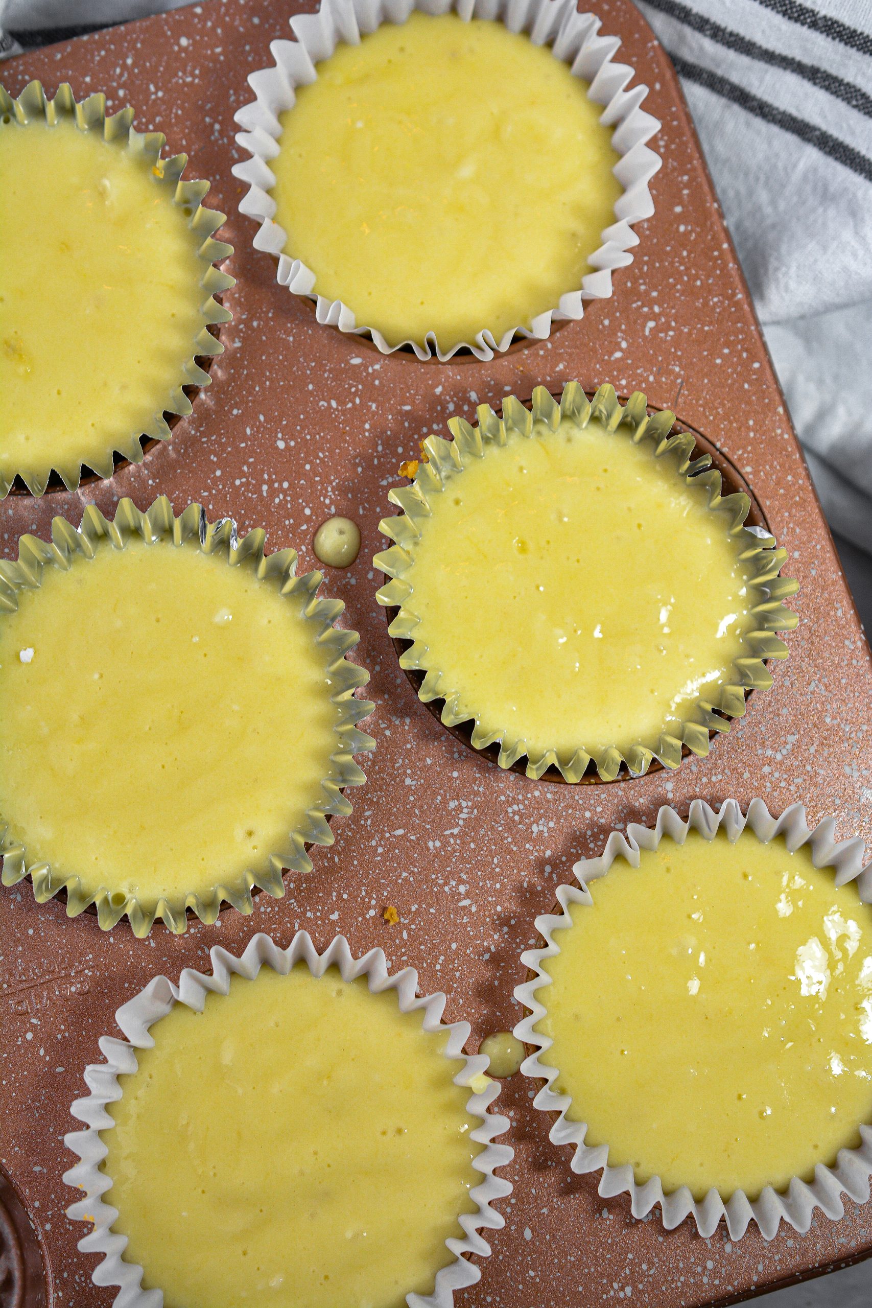 Fill the sections of the muffin tin almost to the top with the cupcake batter. Bake for 20-25 minutes until cooked through. Let cool. 