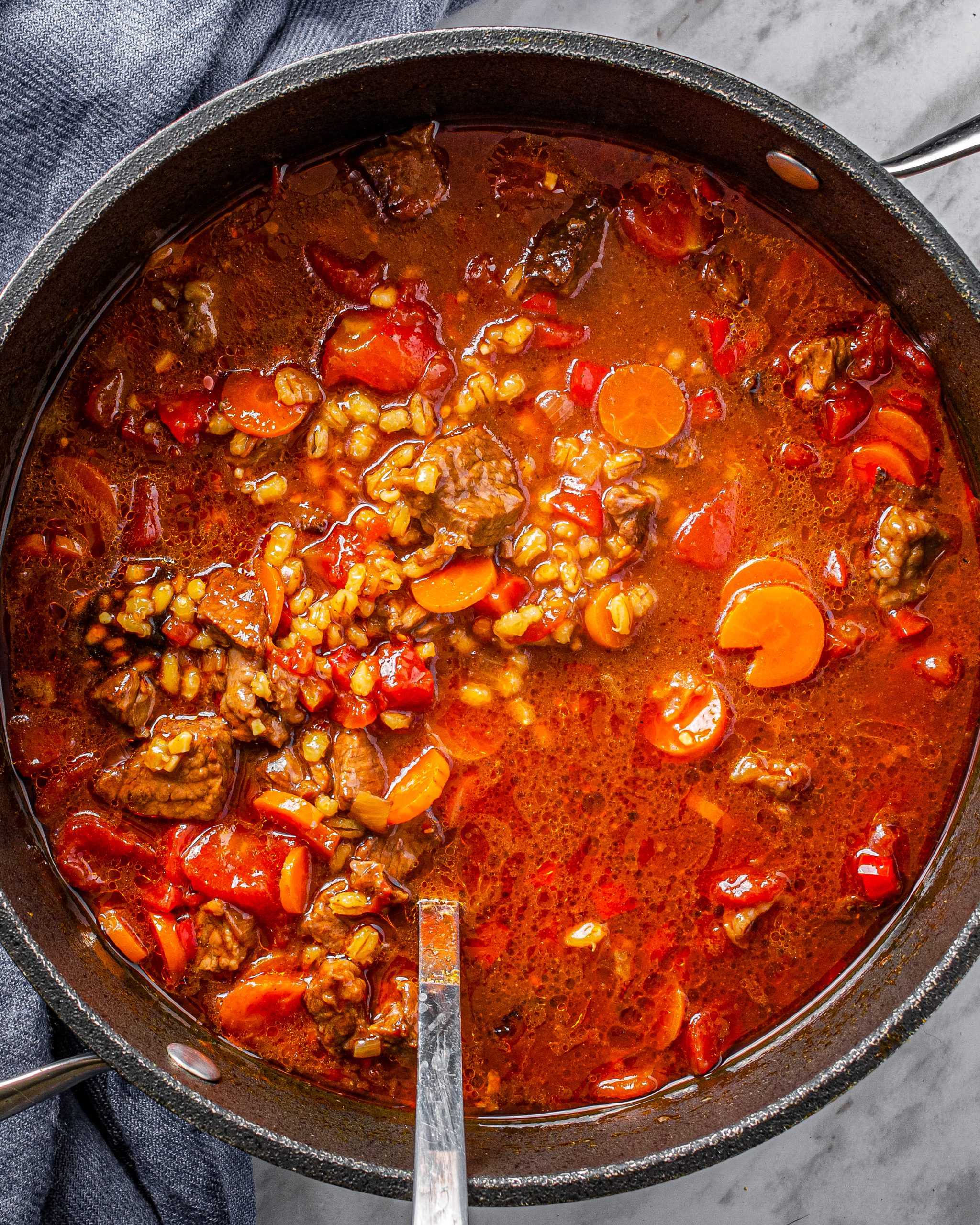 Lower the heat to a simmer and cover, cooking for 50-60 minutes.