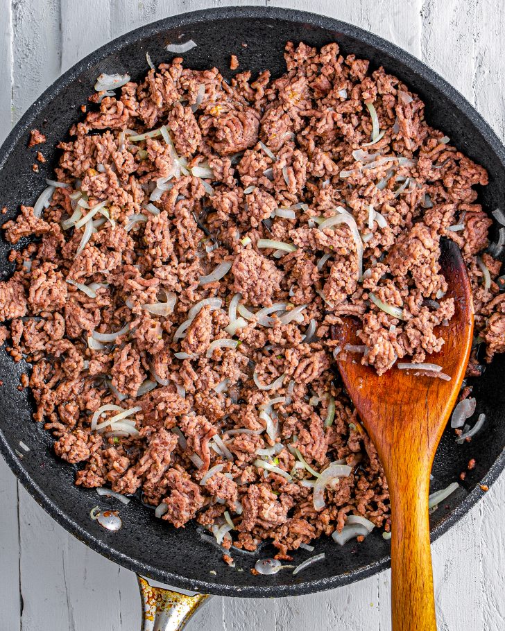 Cook the ground beef and onion over medium-high heat.