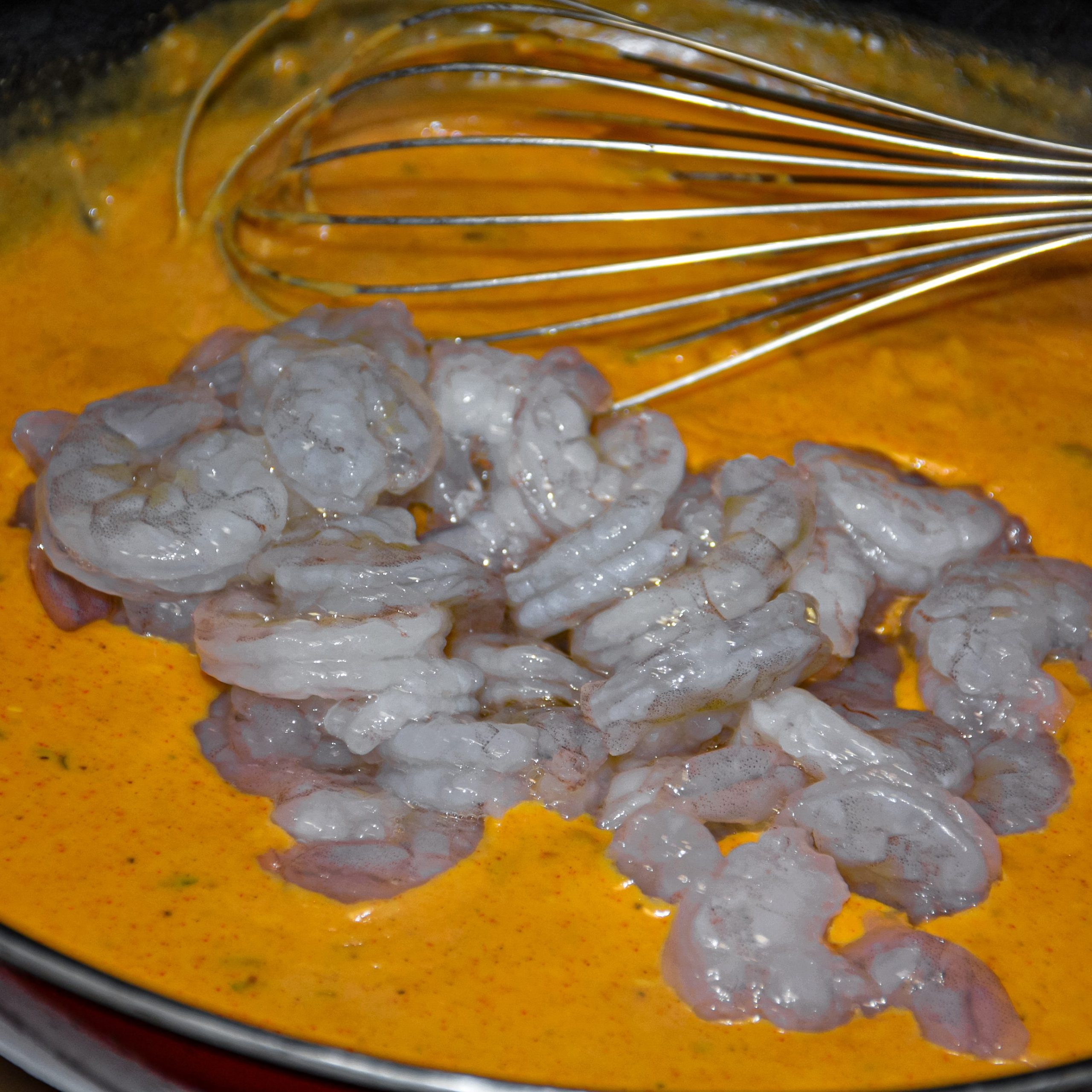 Add your shrimp, and cook until fully heated, the shrimp will turn to beige color and no longer translucent.