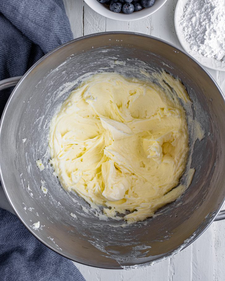 Blend together the creamy cheese, granulated sugar, and lemon juice in a mixing bowl until smooth. 