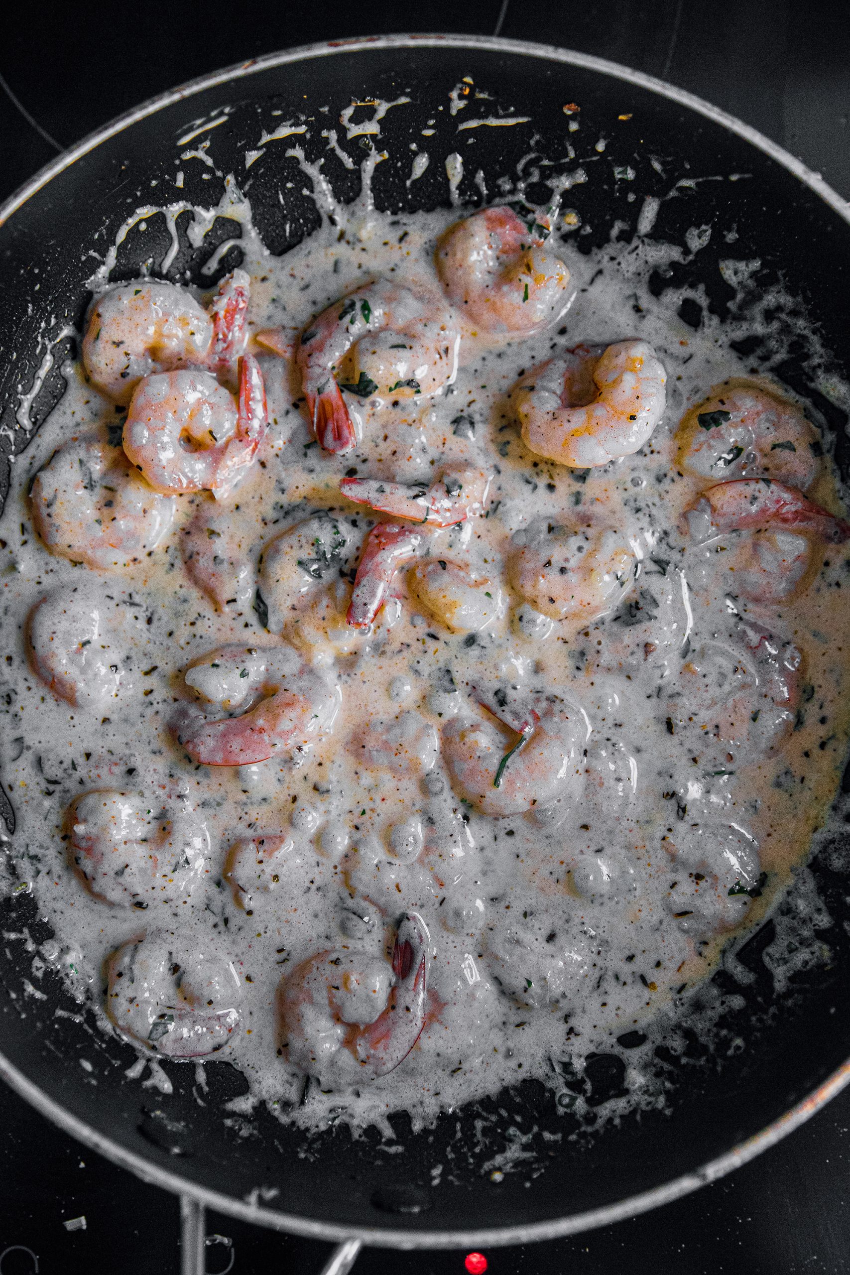Toss shrimp to coat with sauce