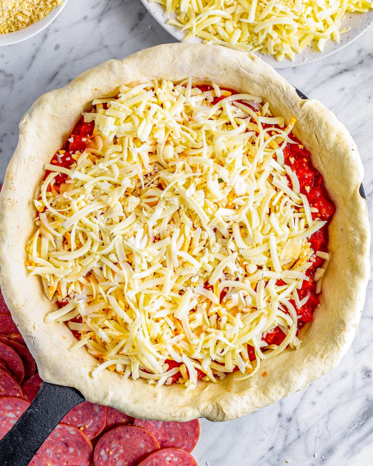 Sprinkle a layer of mozzarella cheese.