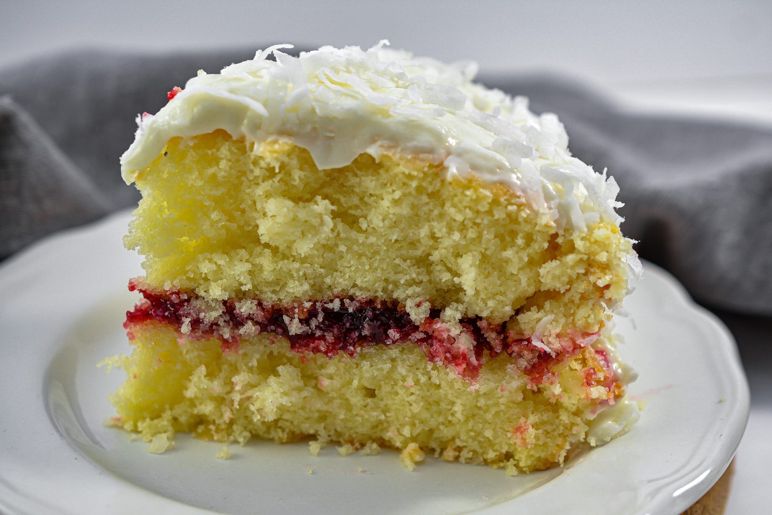 Coconut Cake with Raspberry Filling - Sweet Pea's Kitchen