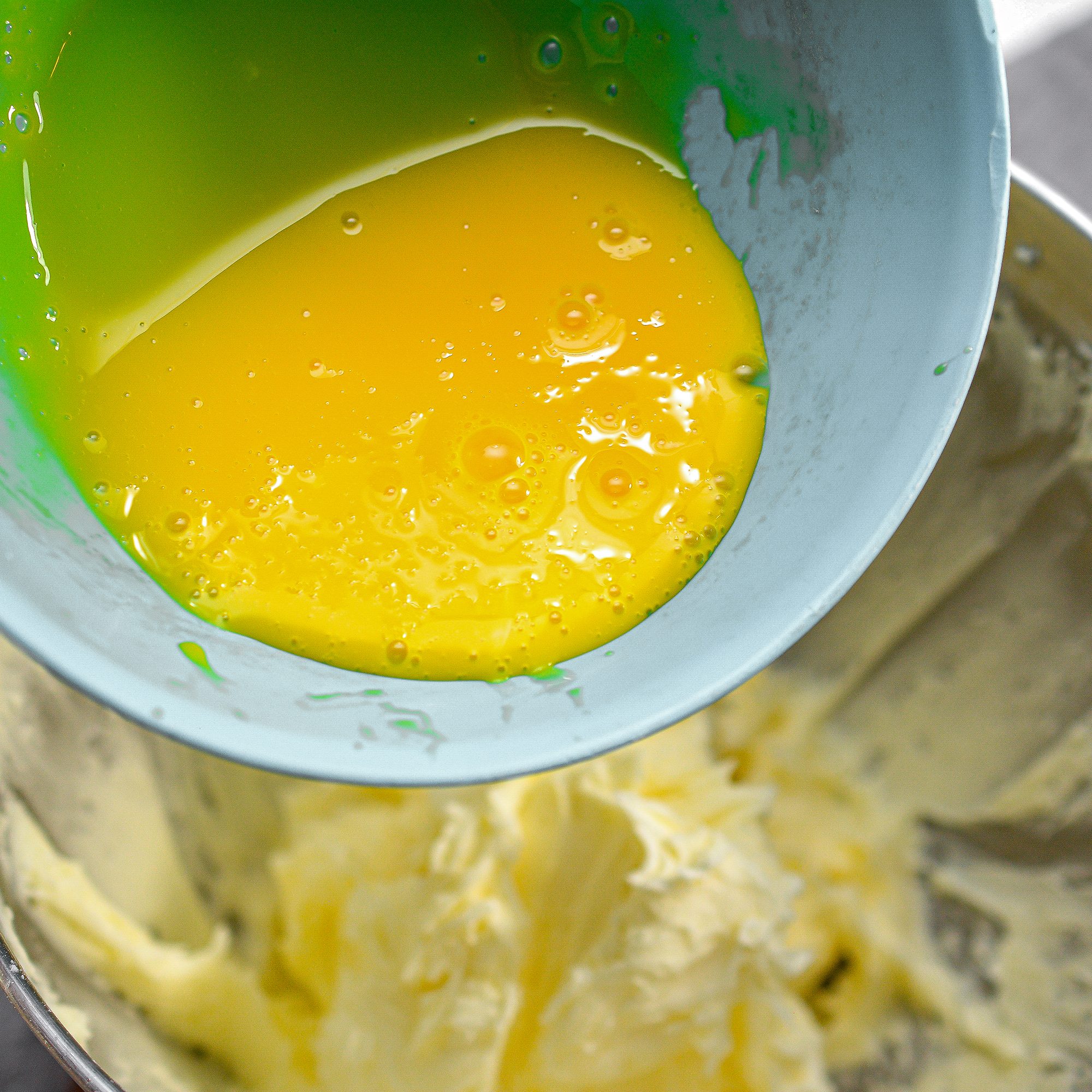 Mix in the egg yolks.