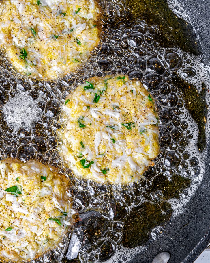 Add the crab cakes to the skillet.