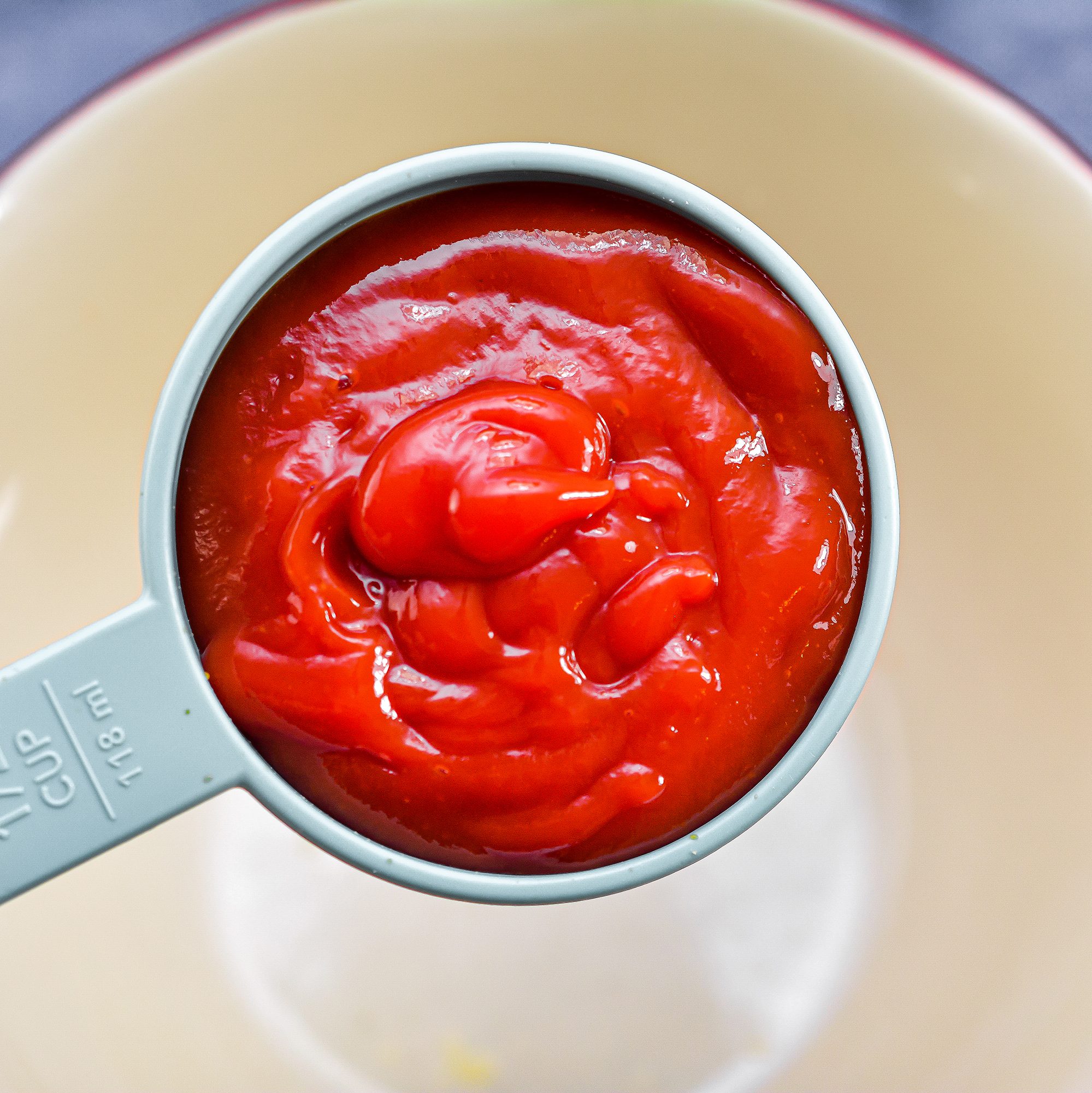 In a bowl, add ½ cup of Ketchup.