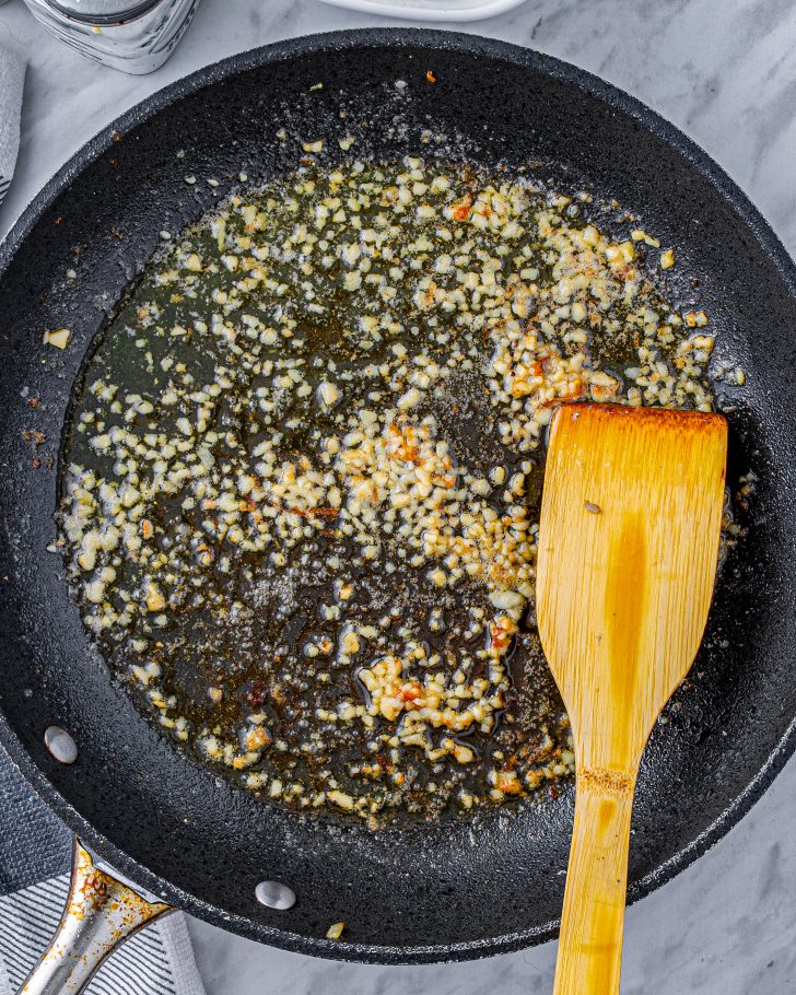 add the butter and garlic to the skillet