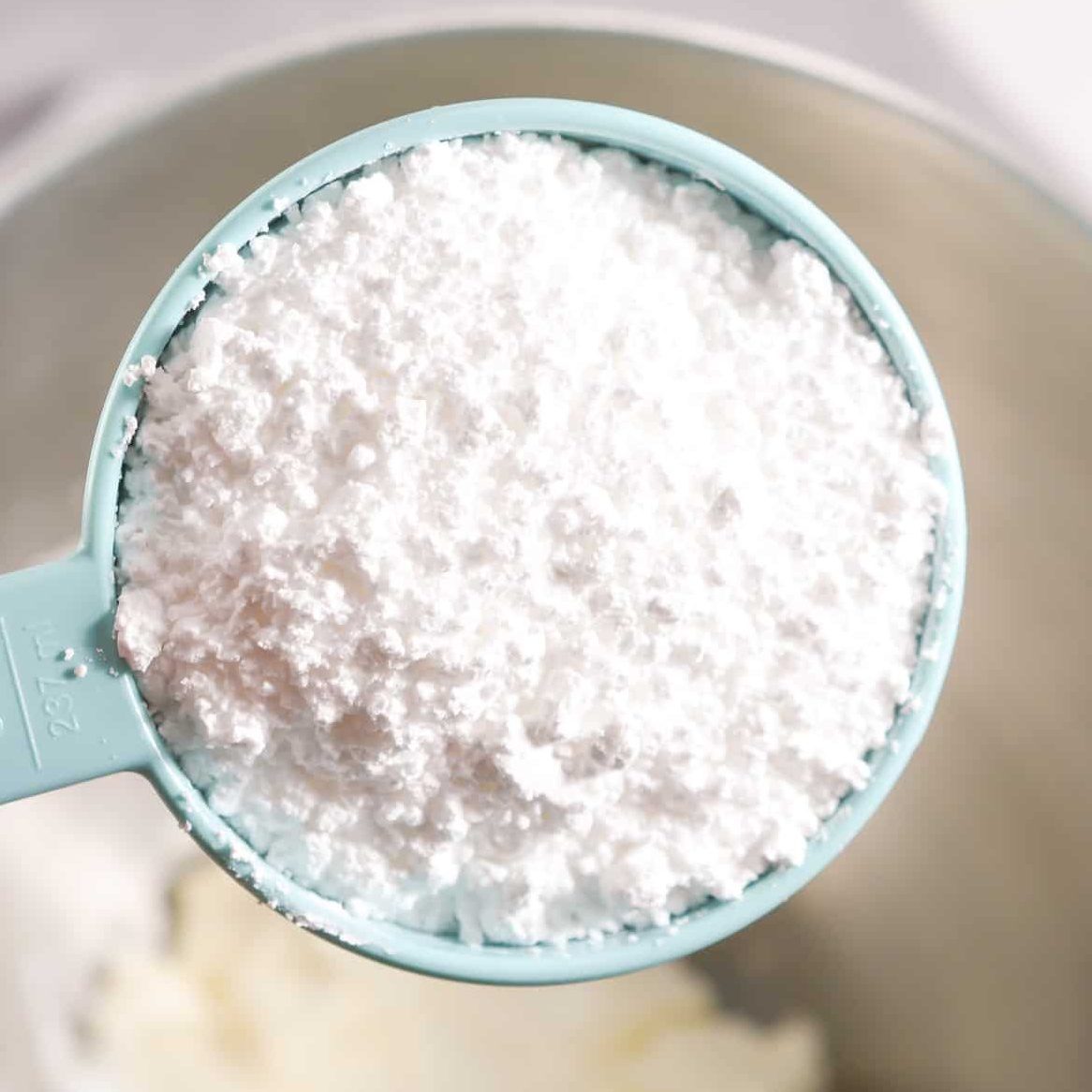 In a mixing bowl, beat together the cream cheese and powdered sugar until smooth.