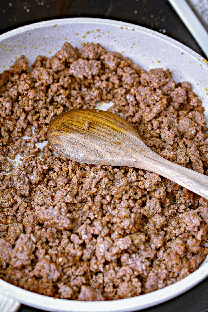 Cook the ground beef in a large skillet over medium-high heat until completely browned.