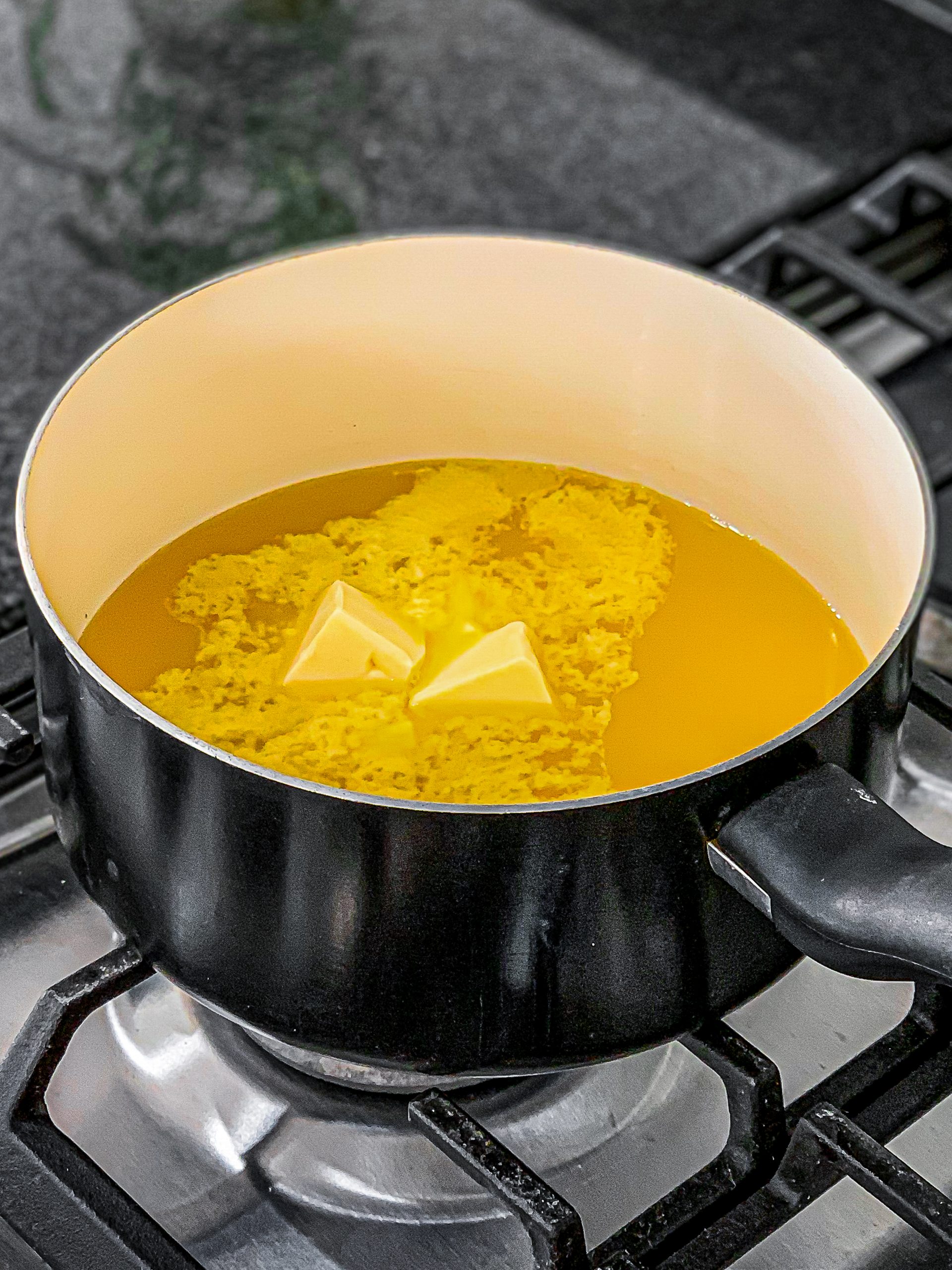 In a medium saucepan, add butter, orange juice, and sugar.