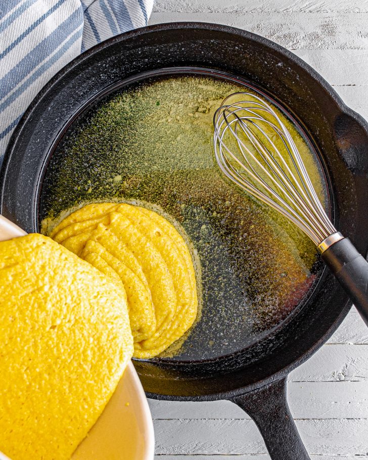 Once the butter is melted, remove the skillet from the heat, and pour the batter into it.