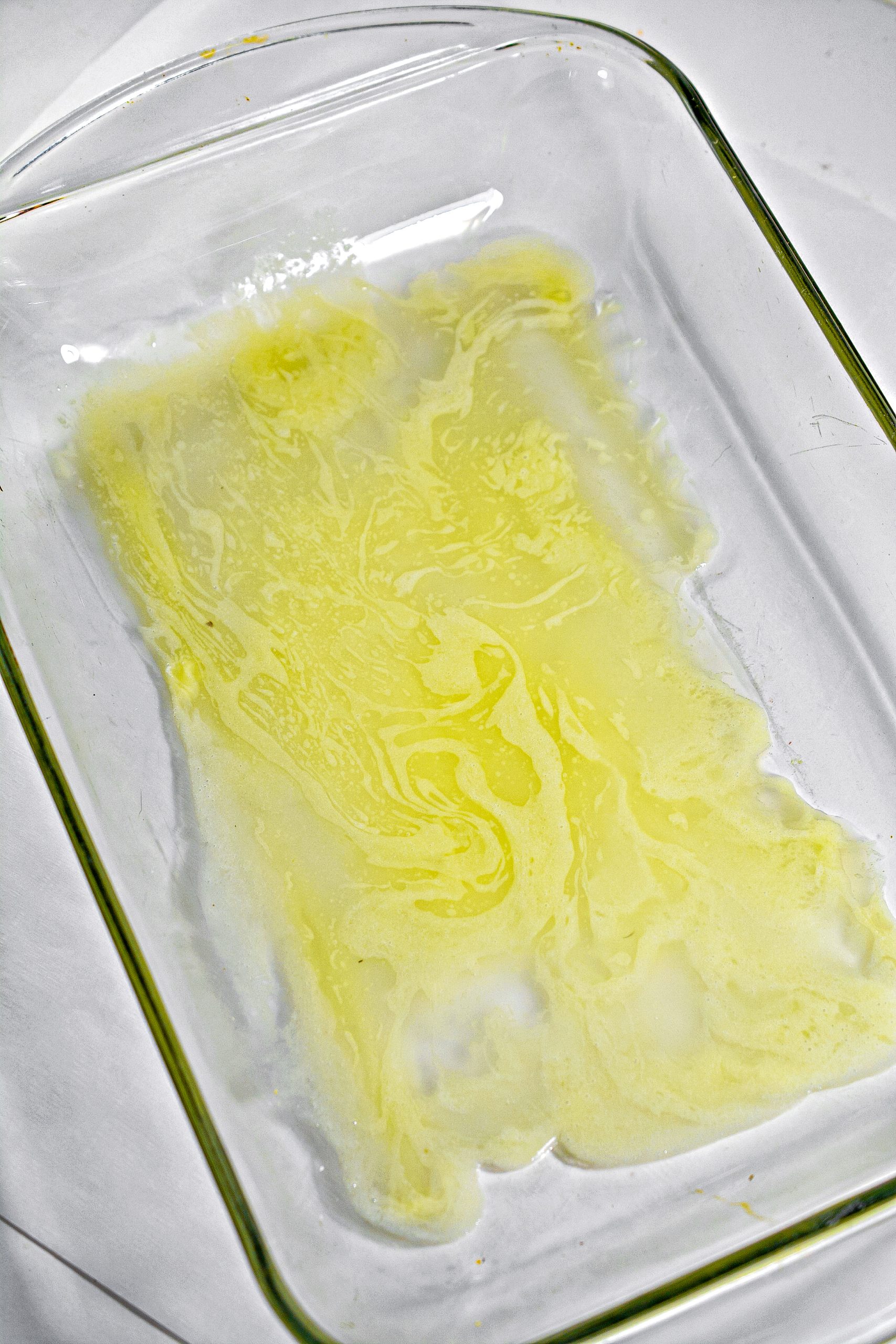 Pour the butter into a 9x13 baking dish