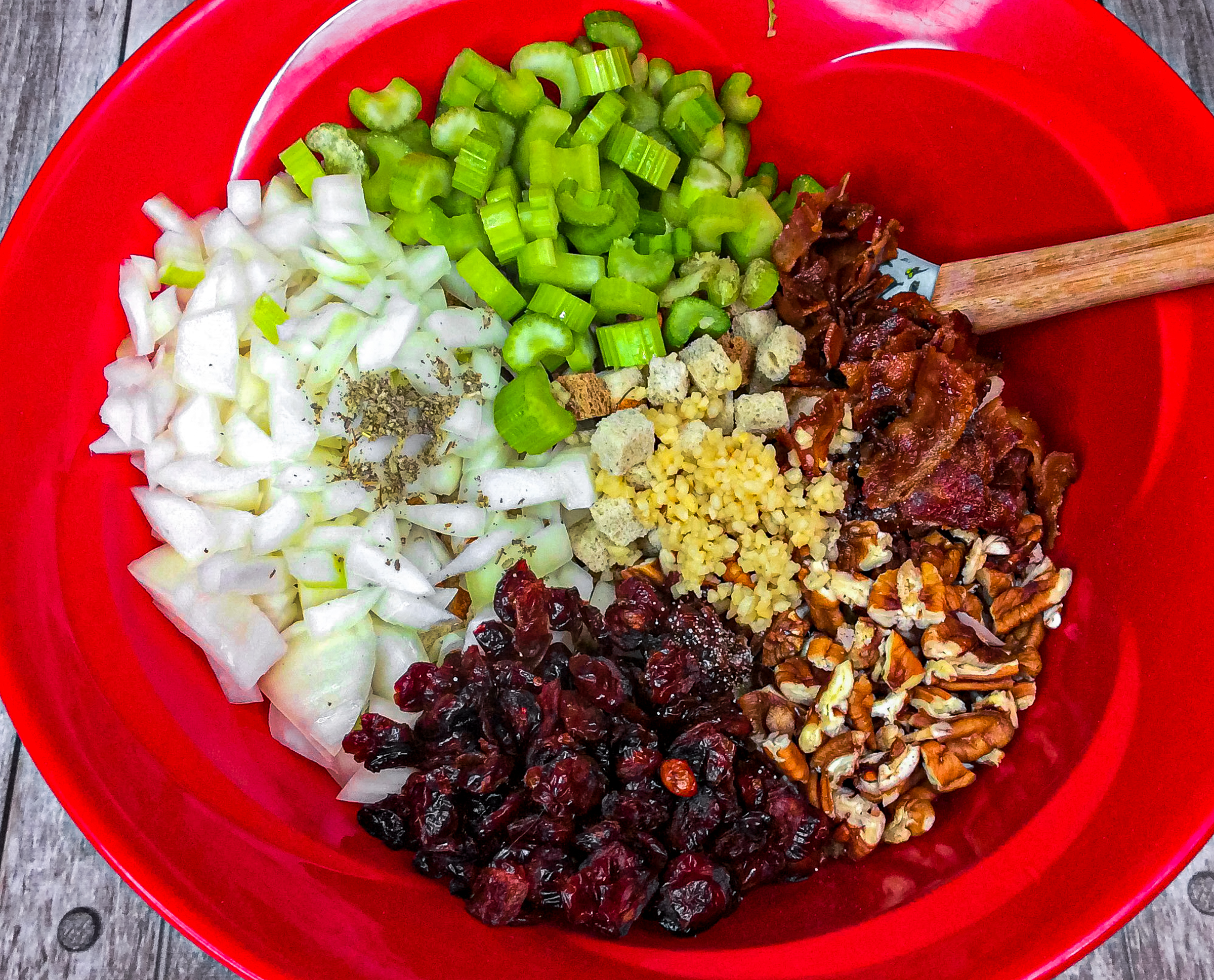 Chop up the celery, onion, cranberries, and pecans.