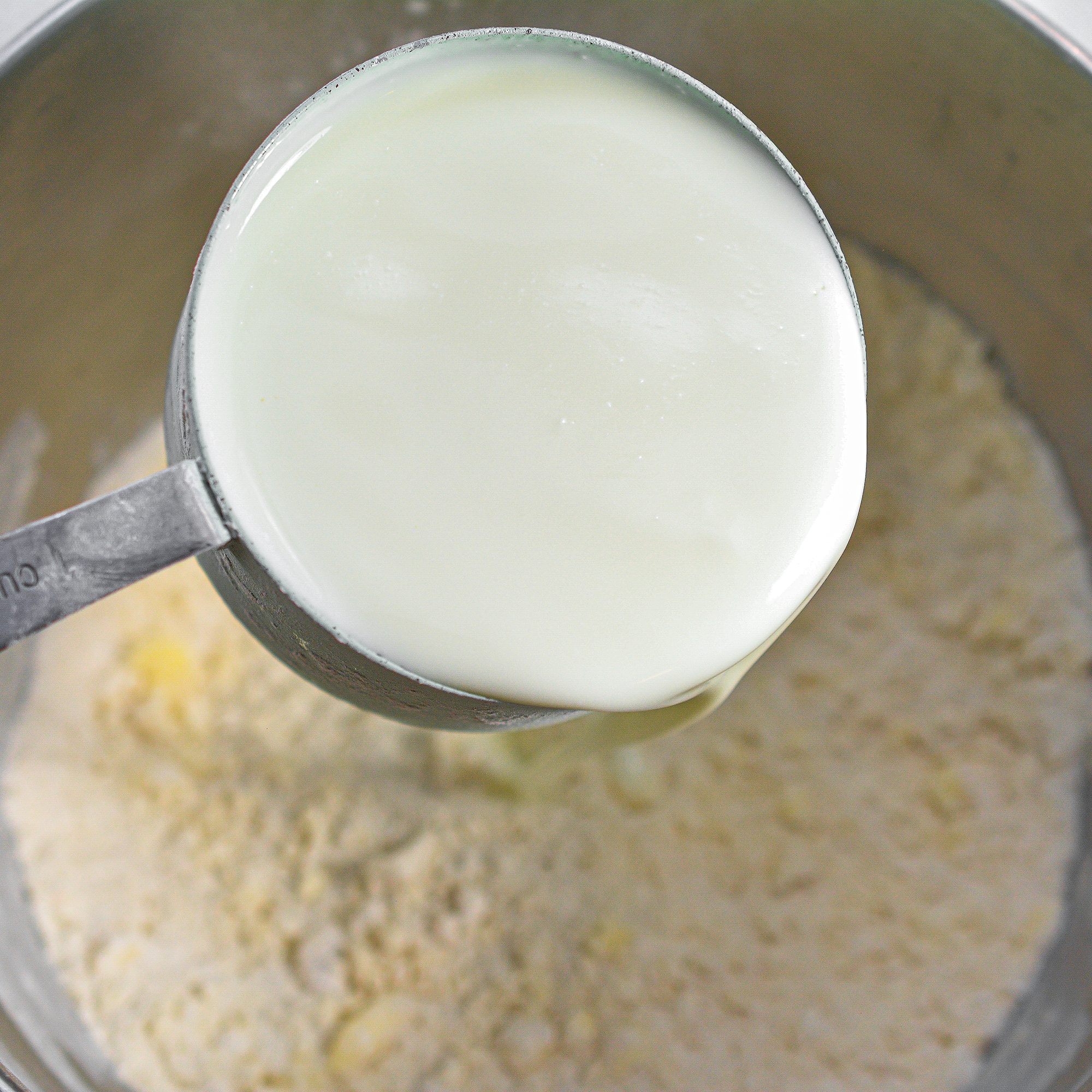 Pour in the buttermilk and stir until a dough has formed.