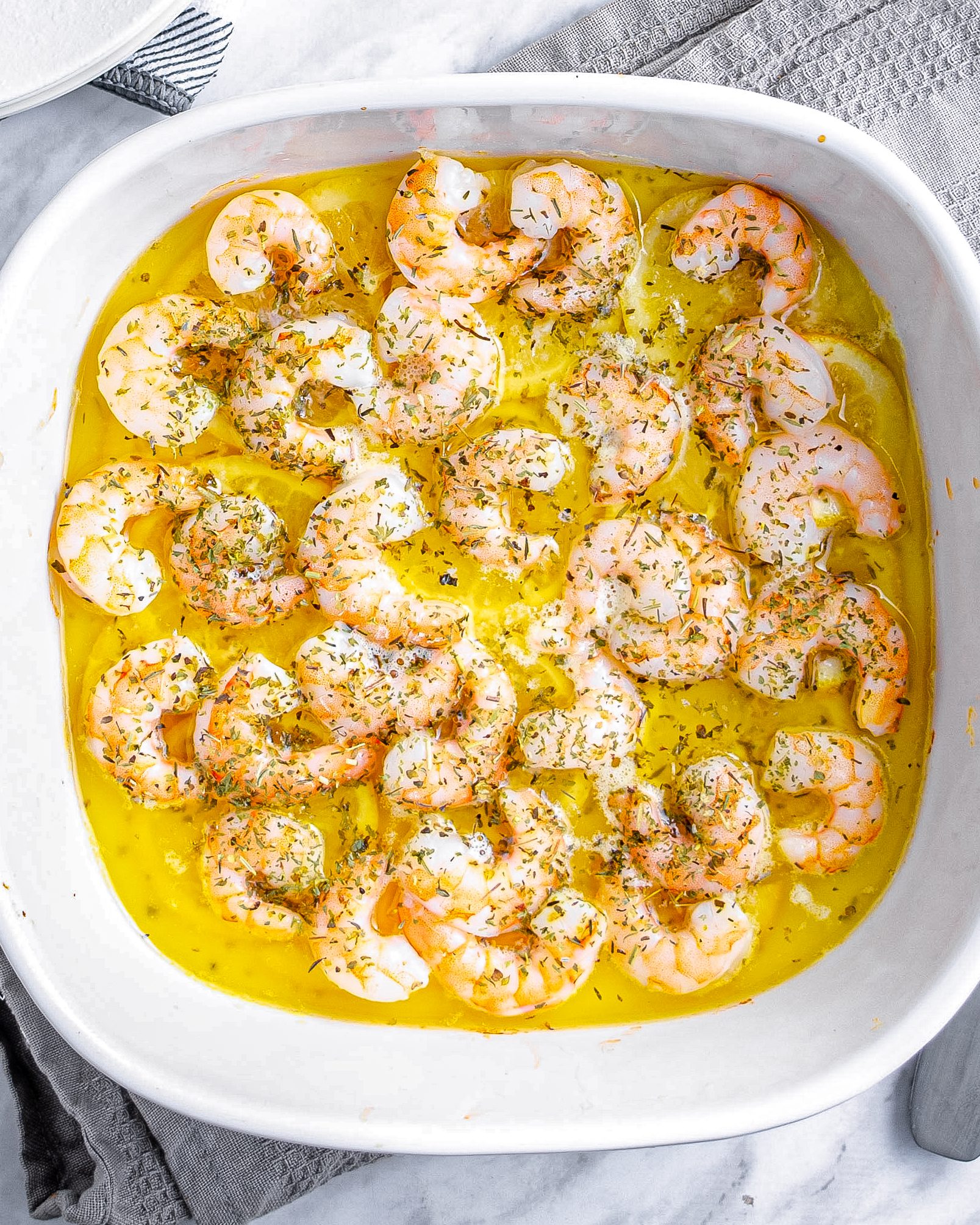 Sprinkle the Italian Seasoning over the shrimp.