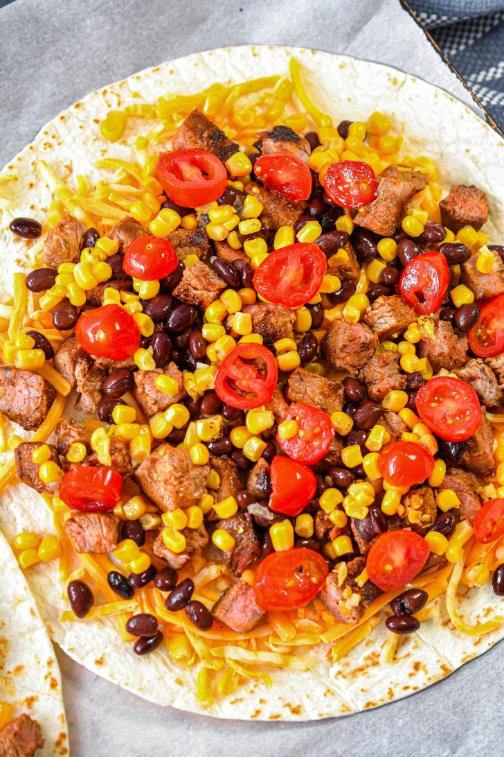 add ½ cup of fire-roasted corn drained and ½ cup of cherry tomatoes sliced.