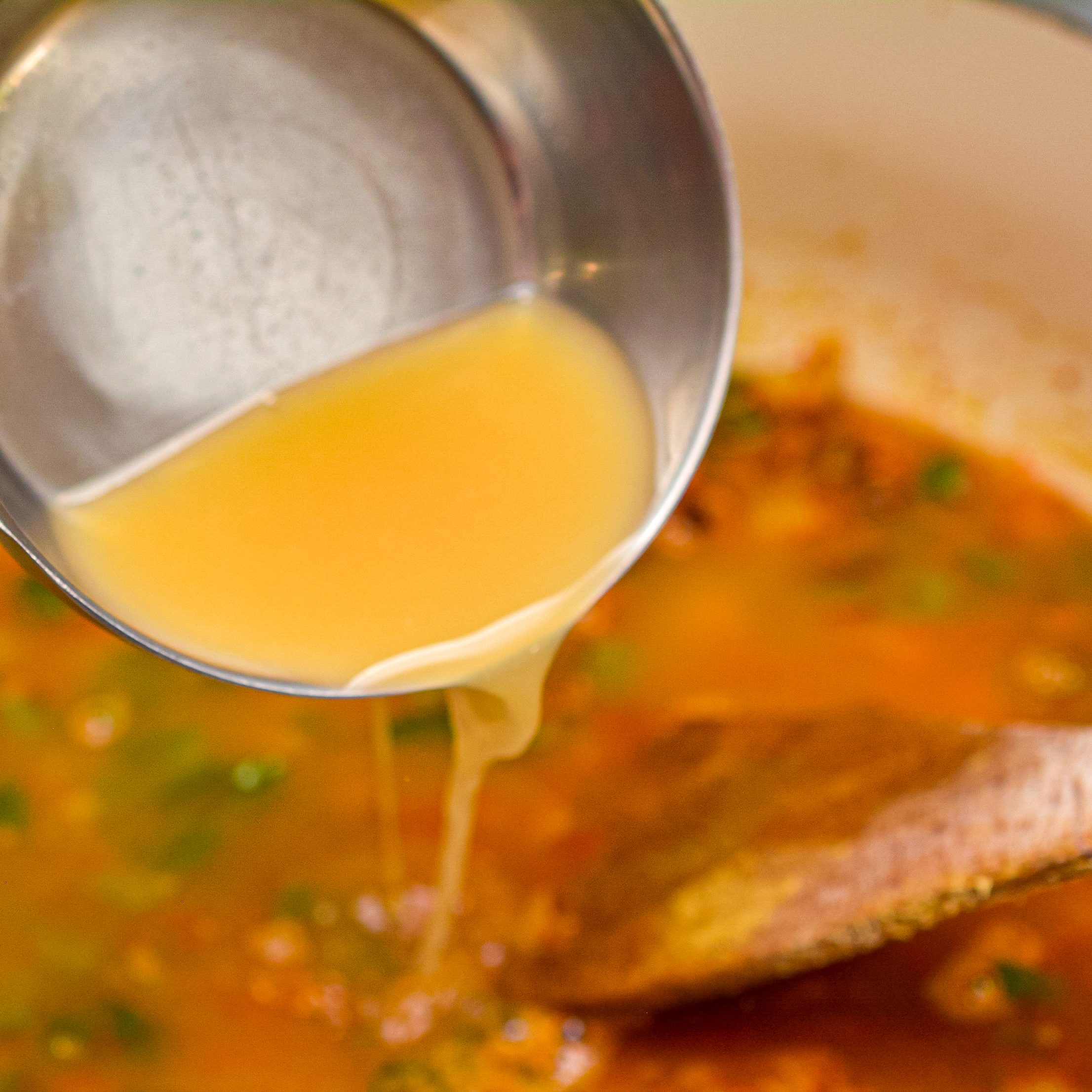 Whisk in 2 cups of chicken bone broth, and stir until well combined.