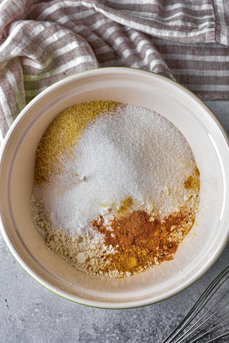 Whisk together the flour, sugar, baking powder, baking soda, spices, salt, and brown sugar in a bowl. 