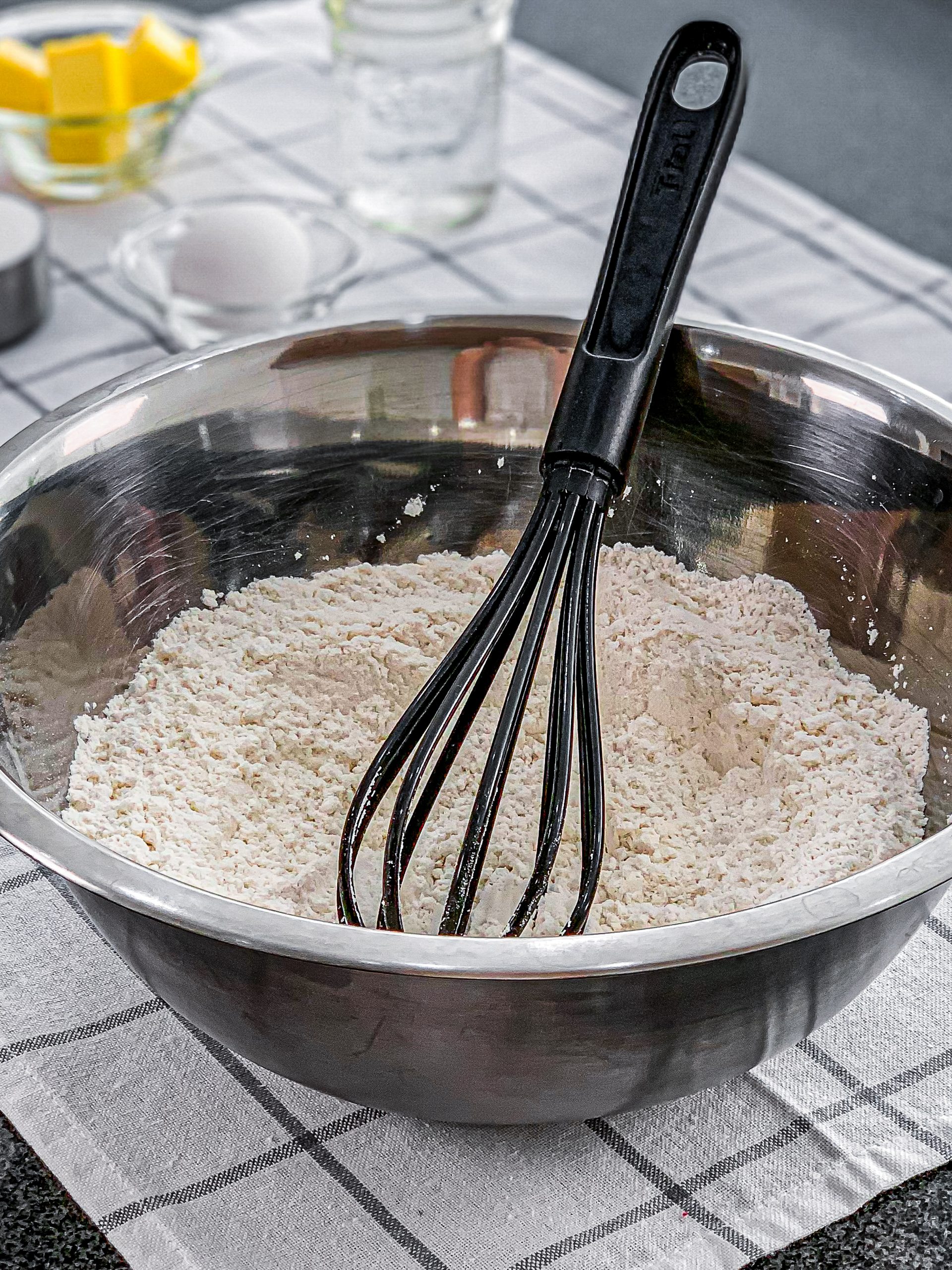 Mix flour and salt together in a large bowl with a whisk.