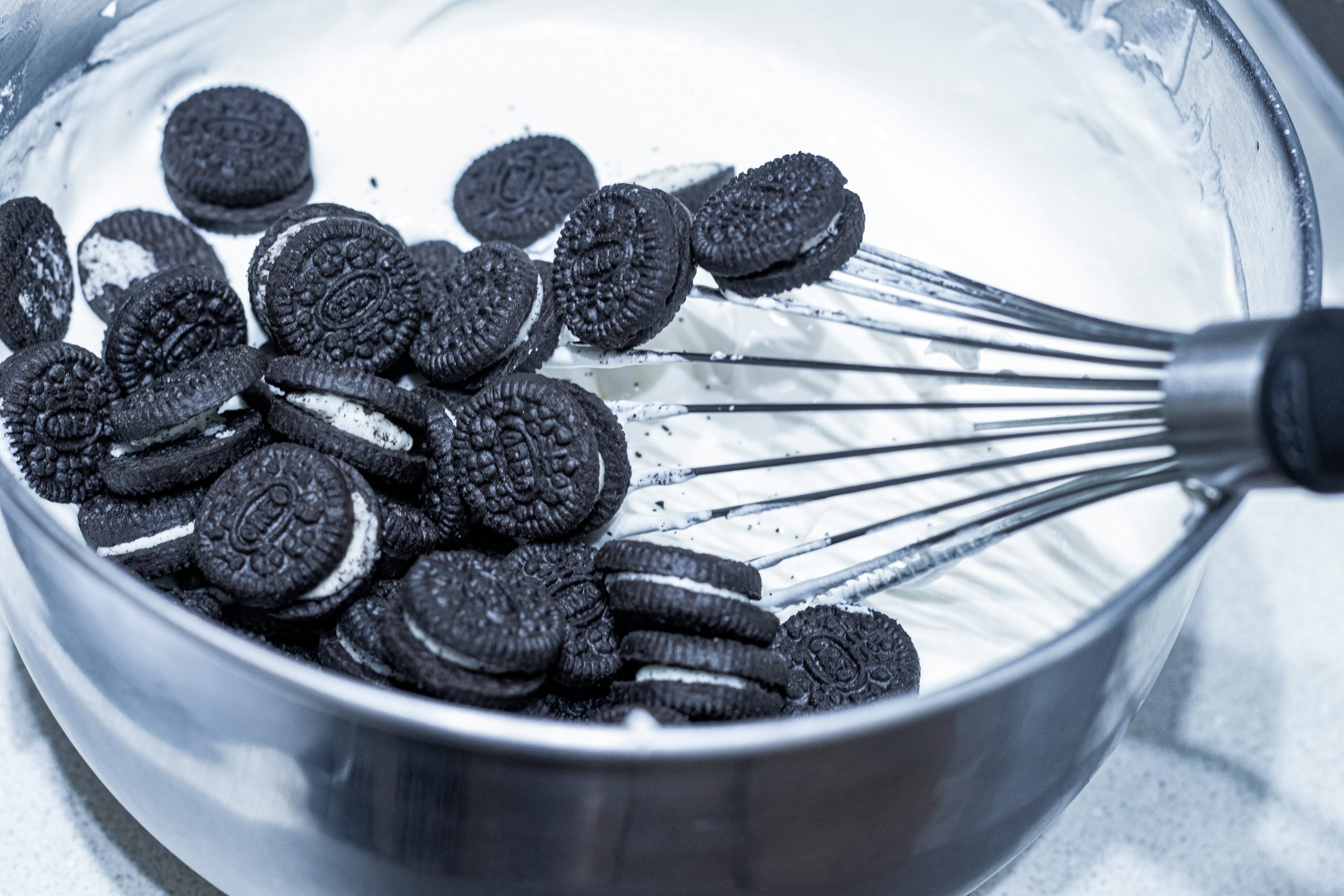 Add mini Oreos to the mixture and combine.